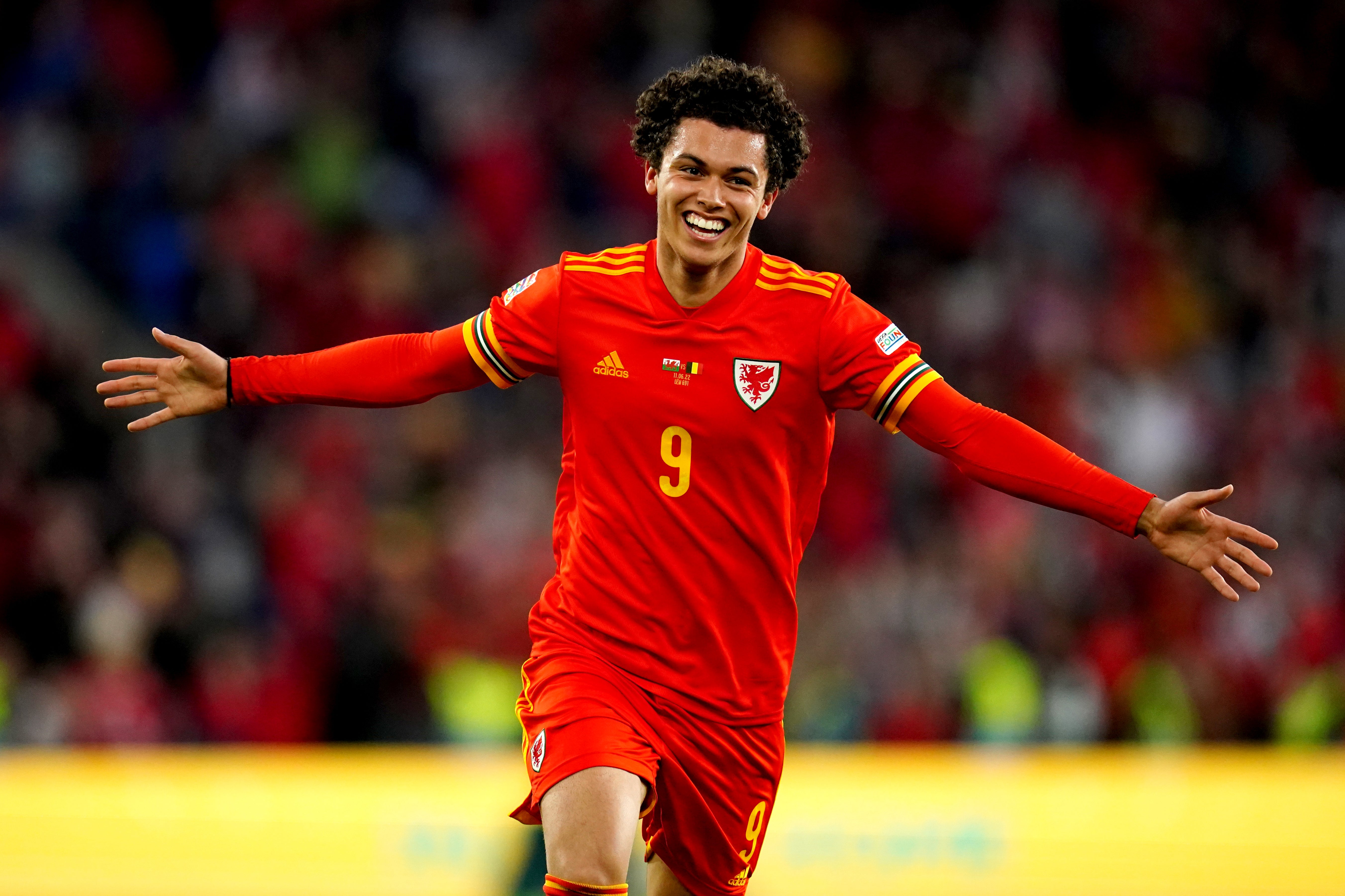 Brennan Johnson celebrates scoring his first Wales goal against Belgium (David Davies/PA)