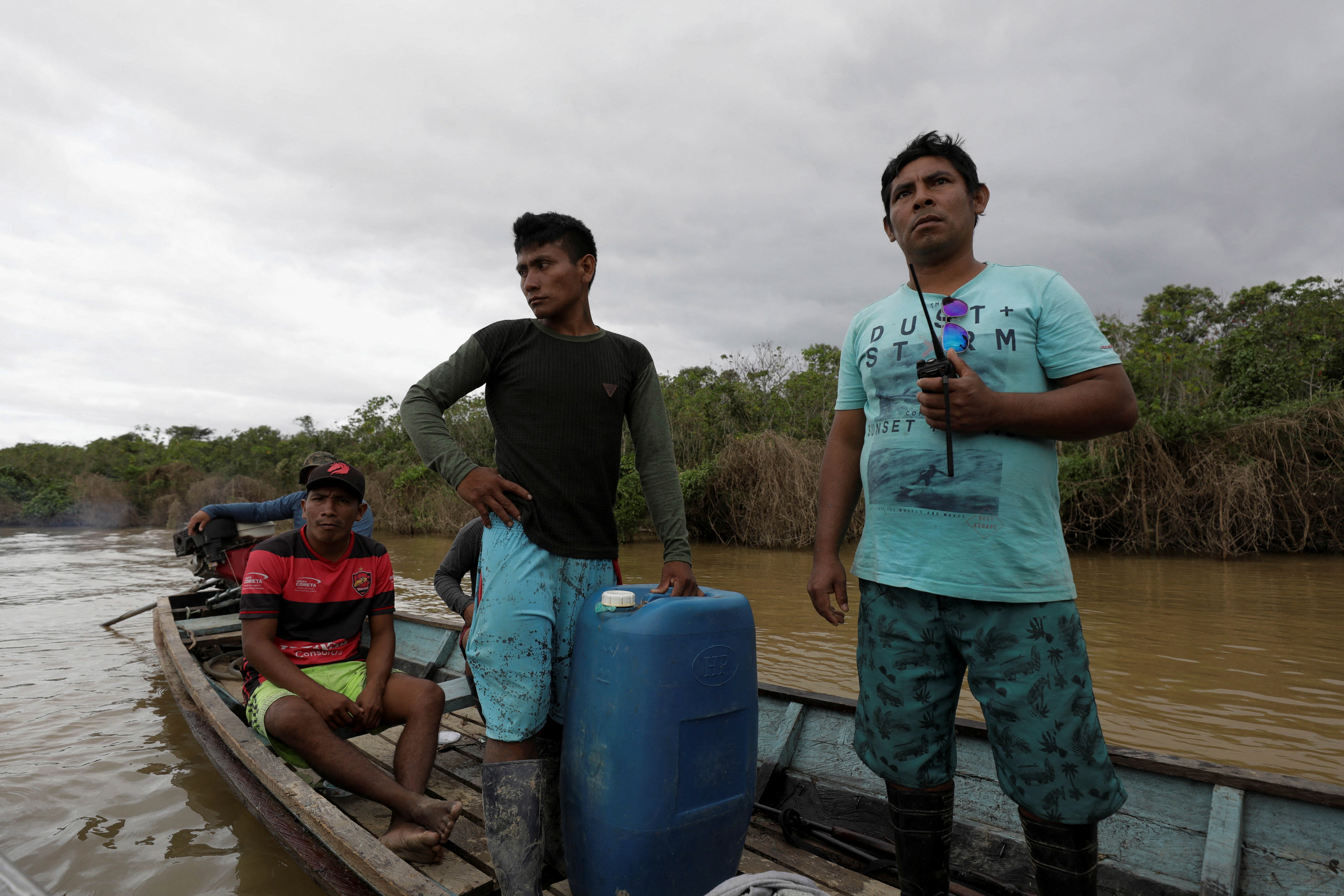 Two indigenous men take part in the search for Dom Phillips and Bruno Pereira