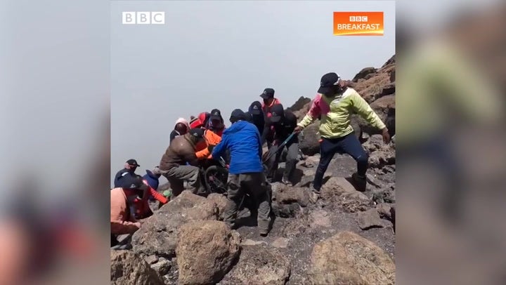 Father paralysed in Manchester Arena bombing summits Mount Kilimanjaro in wheelchair