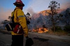 Western wildfires force evacuations in Arizona, California