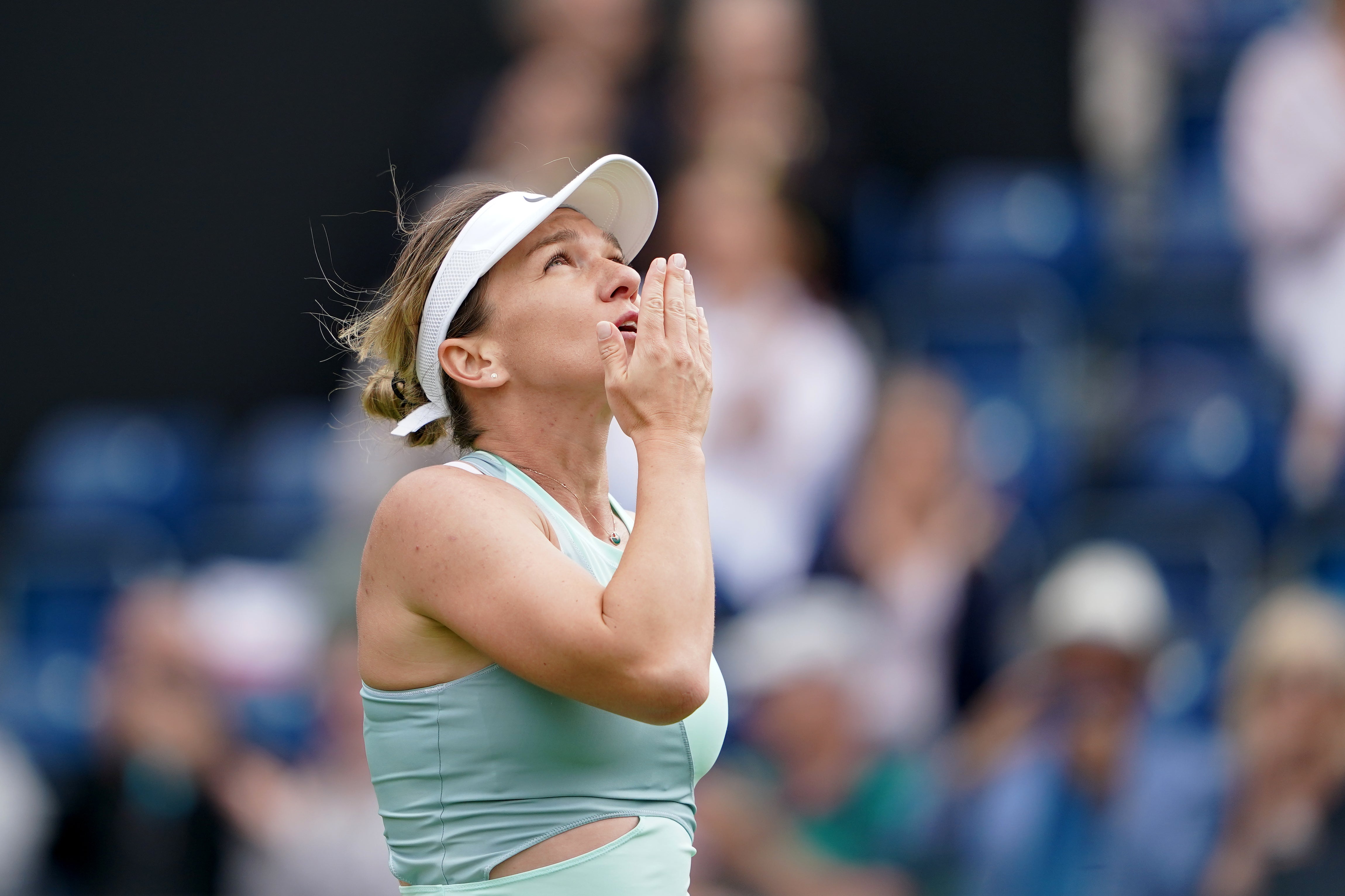 Simona Halep celebrates her victory over Lesia Tsurenko (Zac Goodwin/PA)