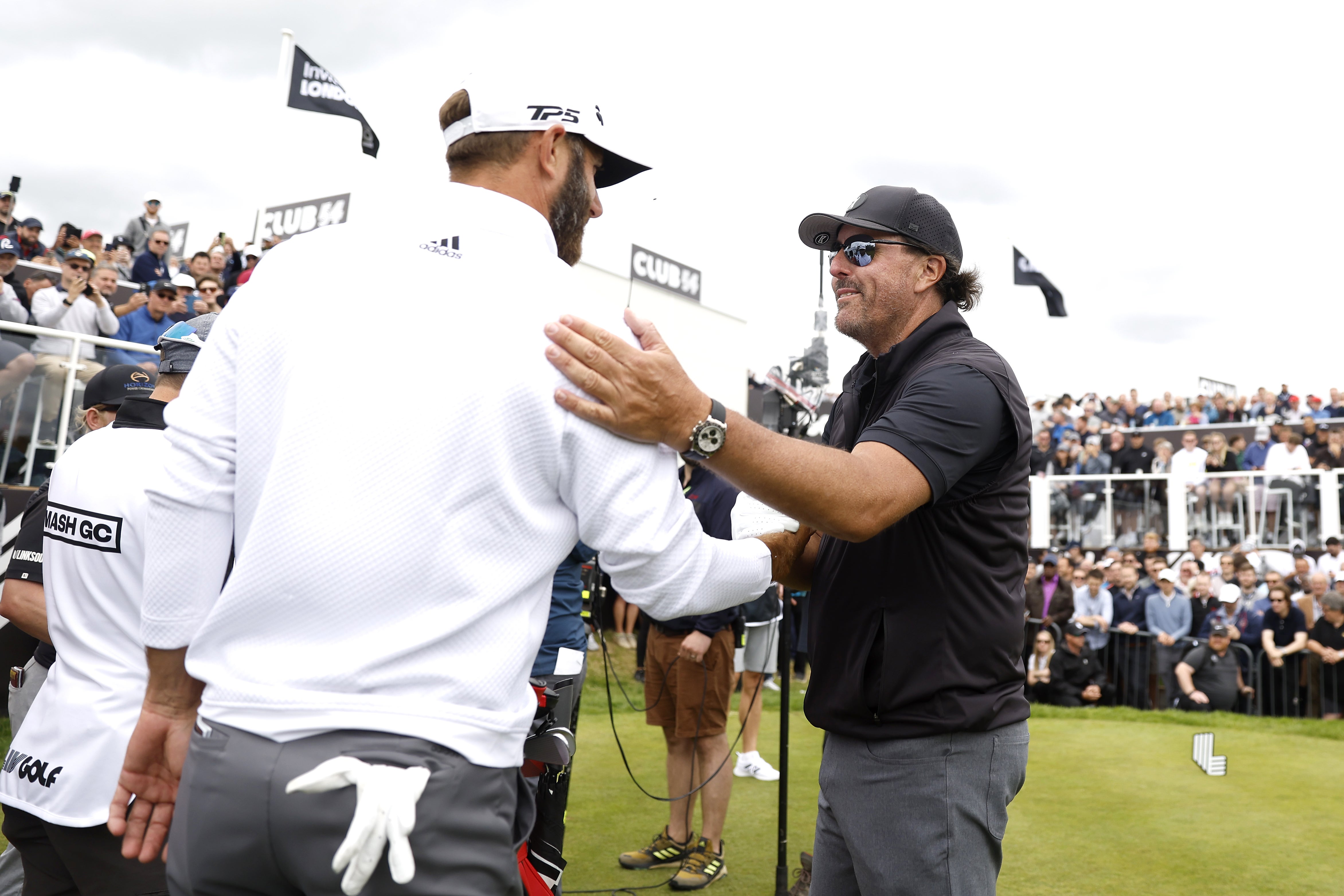 Phil Mickelson (right) and Dustin Johnson during day one of the LIV Golf Invitational Series at the Centurion Club (Steven Paston/PA)