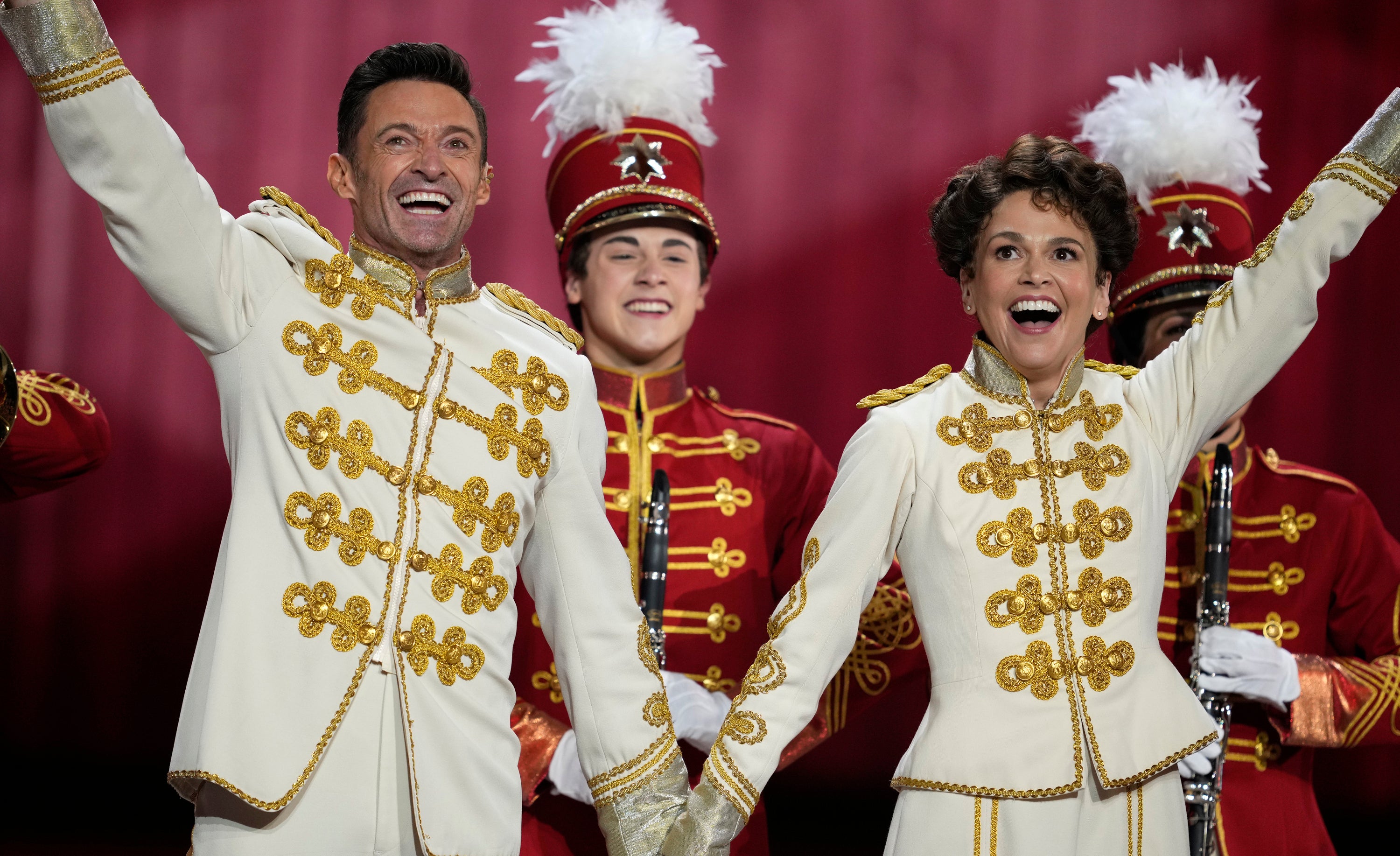 At the Tonys on Sunday night Jackman performed Seventy-Six Trombones with the cast of the current revival which he leads with Sutton Foster (right) (Charles Sykes/AP)