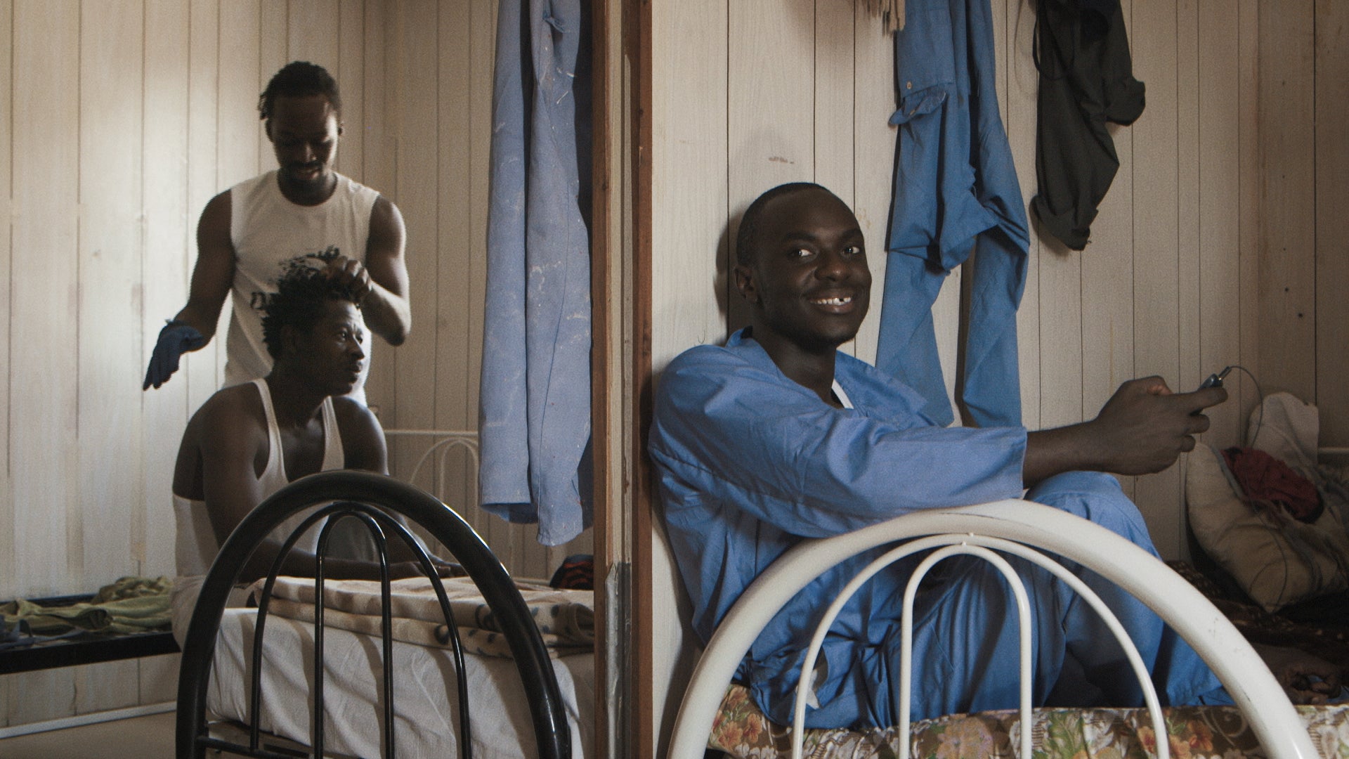 Two of the workers in the film, Calton (right) and Samuel