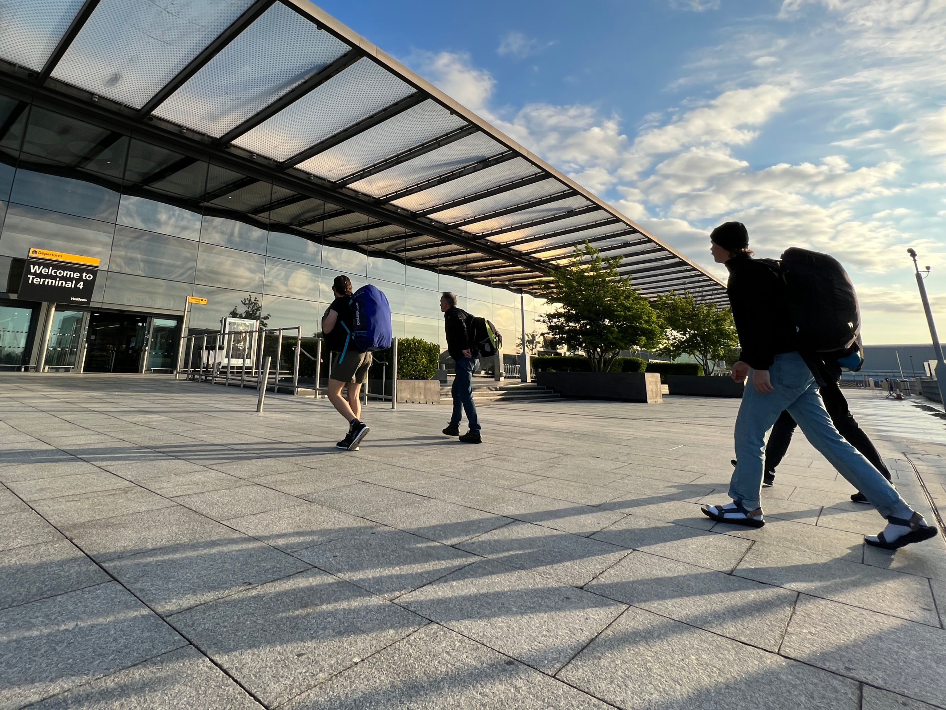 First footers: passengers arriving at Heathrow Terminal 4 at dawn