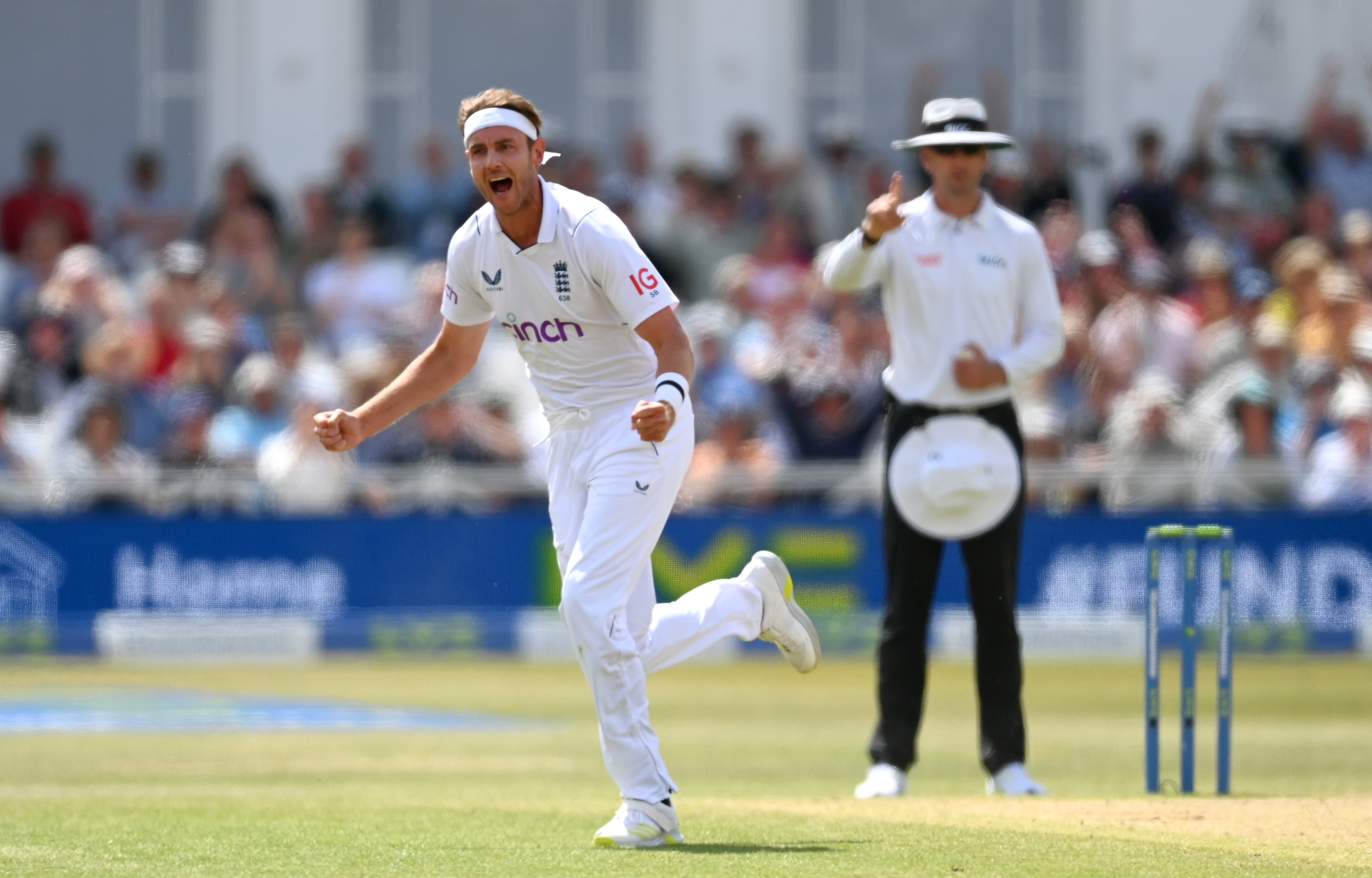 Stuart Broad celebrates taking the wicket of Matt Henry