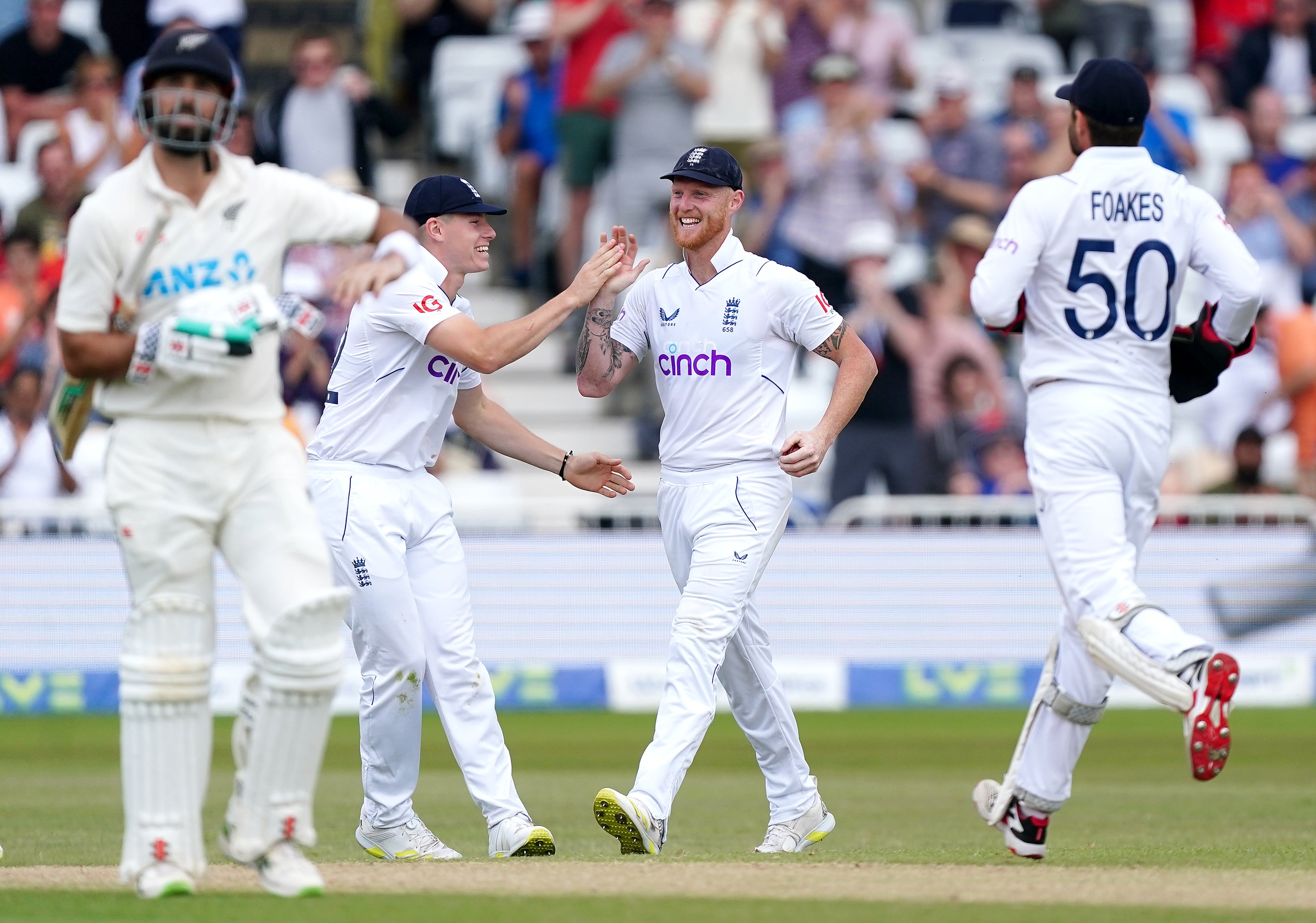 England captain Ben Stokes (centre) celebrates with team-mates after the dismissal of New Zealand No11 Trent Boult (Mike Egerton/PA Images).