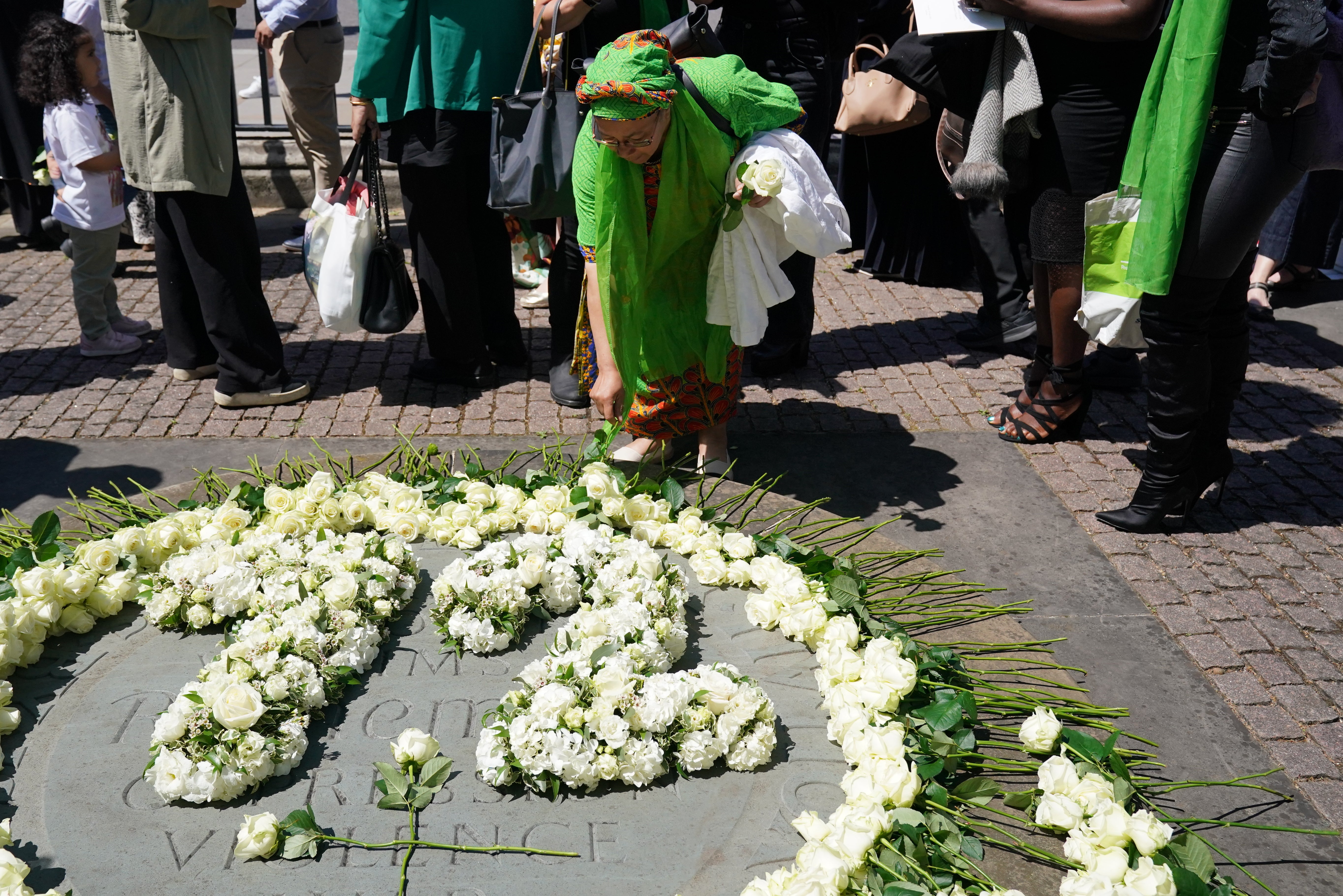 White roses were placed outside Westminster Abbey in London in memory of the Grenfell Tower victims (Jonathan Brady/PA)