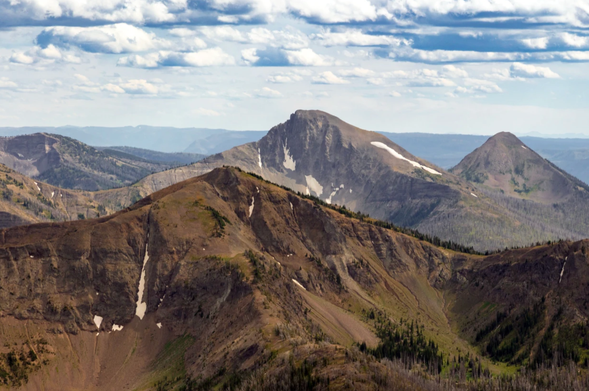 First Peoples Mountain, centre, rises between Top Notch Peak, foreground, and Mt. Stevenson, back right, seen from Avalanche Peak.