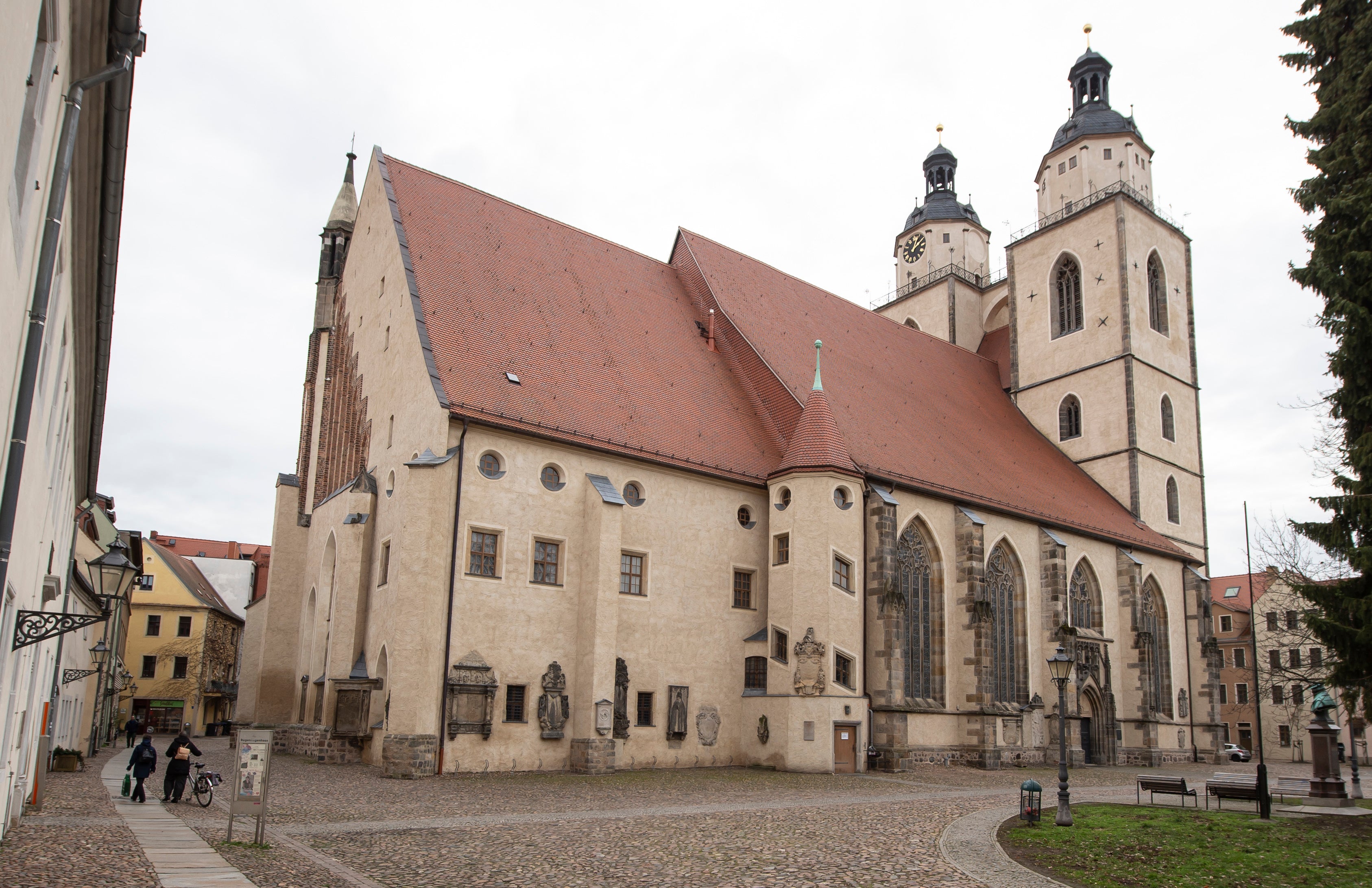 The sculpture adorns the wall of Town Church in Wittenberg, Germany