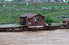 Video shows large home slipping into river and floating away amid historic Yellowstone flooding