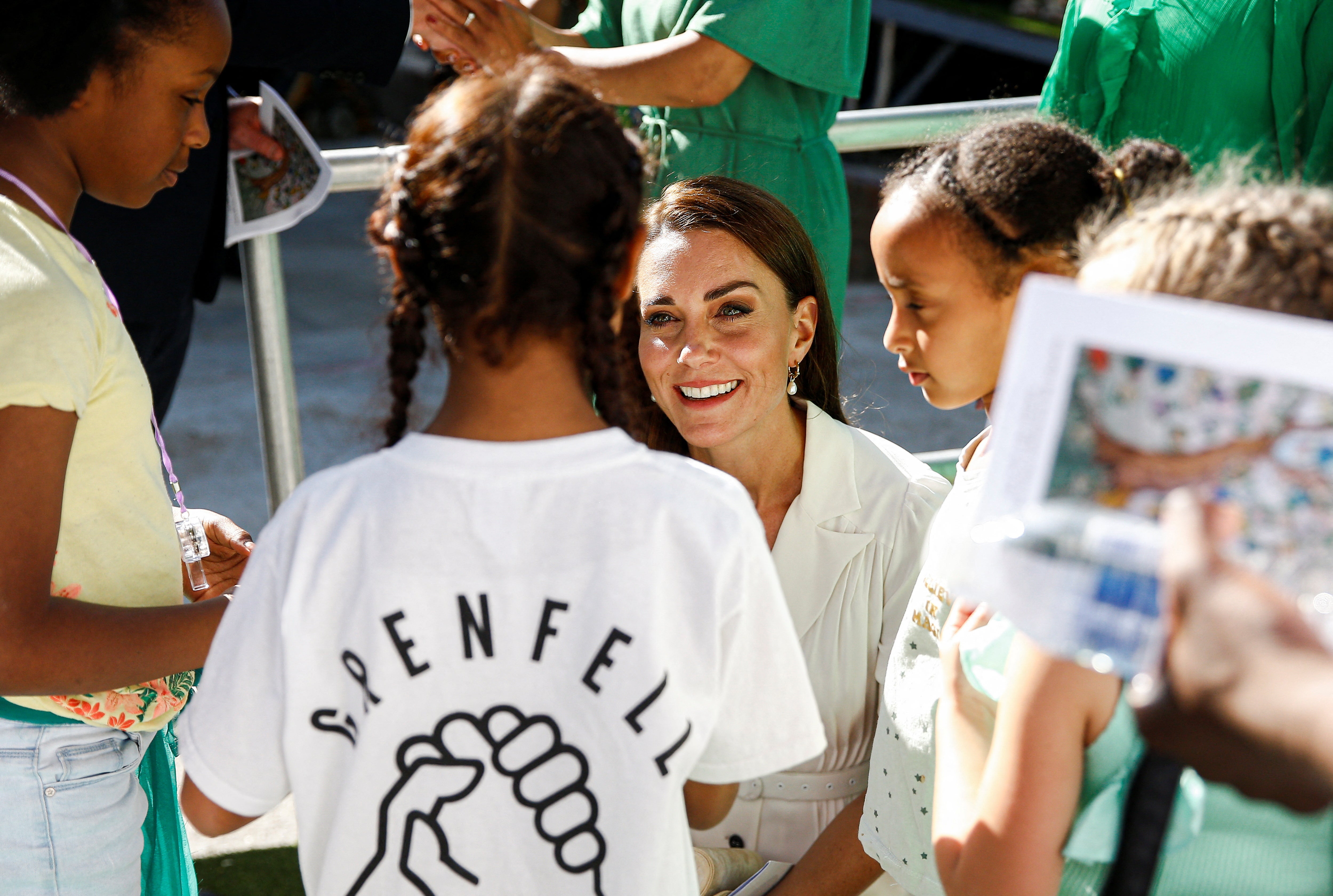 Kate speaks to children who attended the service (Peter Nicholls/PA)