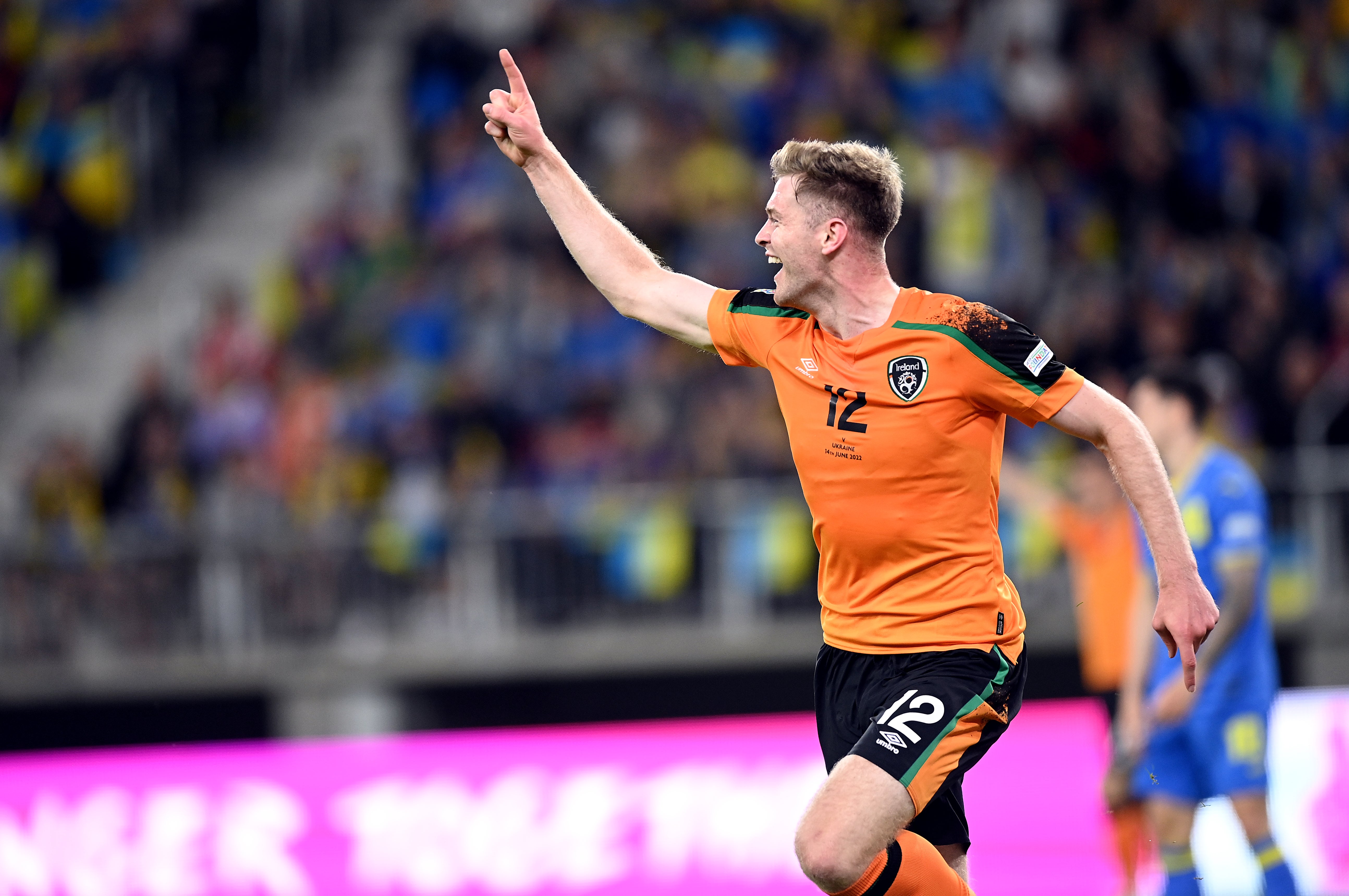 Nathan Collins celebrates scoring against Ukraine (Rafal Oleksiewicz/PA).