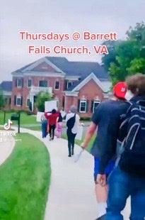 Demonstrators with Ruth Sent Us protesting in Falls Church, Virginia, near the home of Amy Coney Barrett