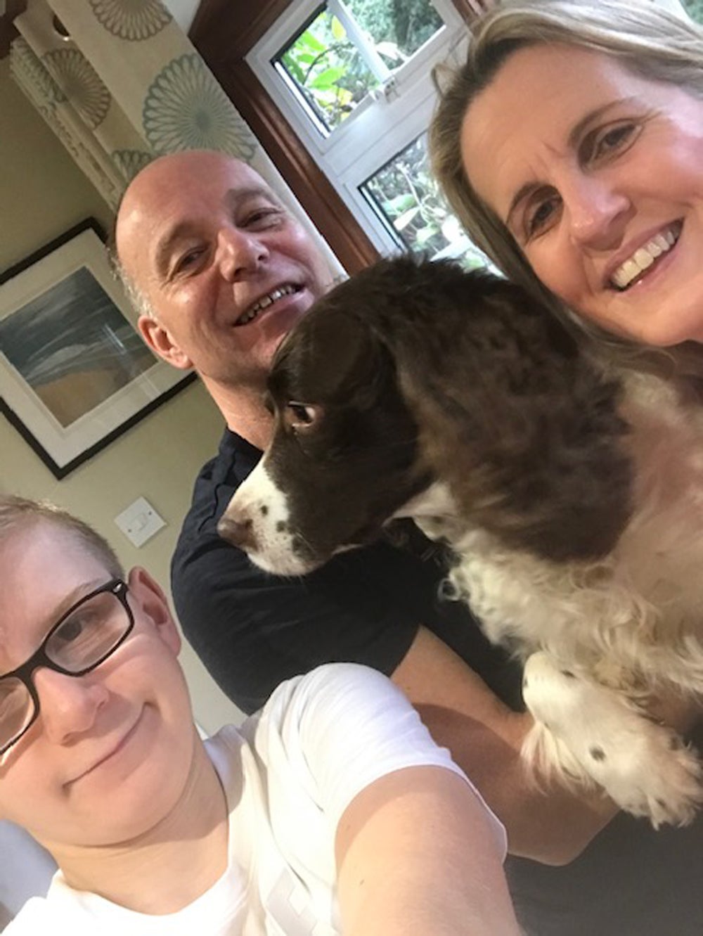 Keith Finch, 56, with his wife, Alison Finch, 50, and Tom Finch, 16, and their dog, Bonzo (Collect/PA Real Life)