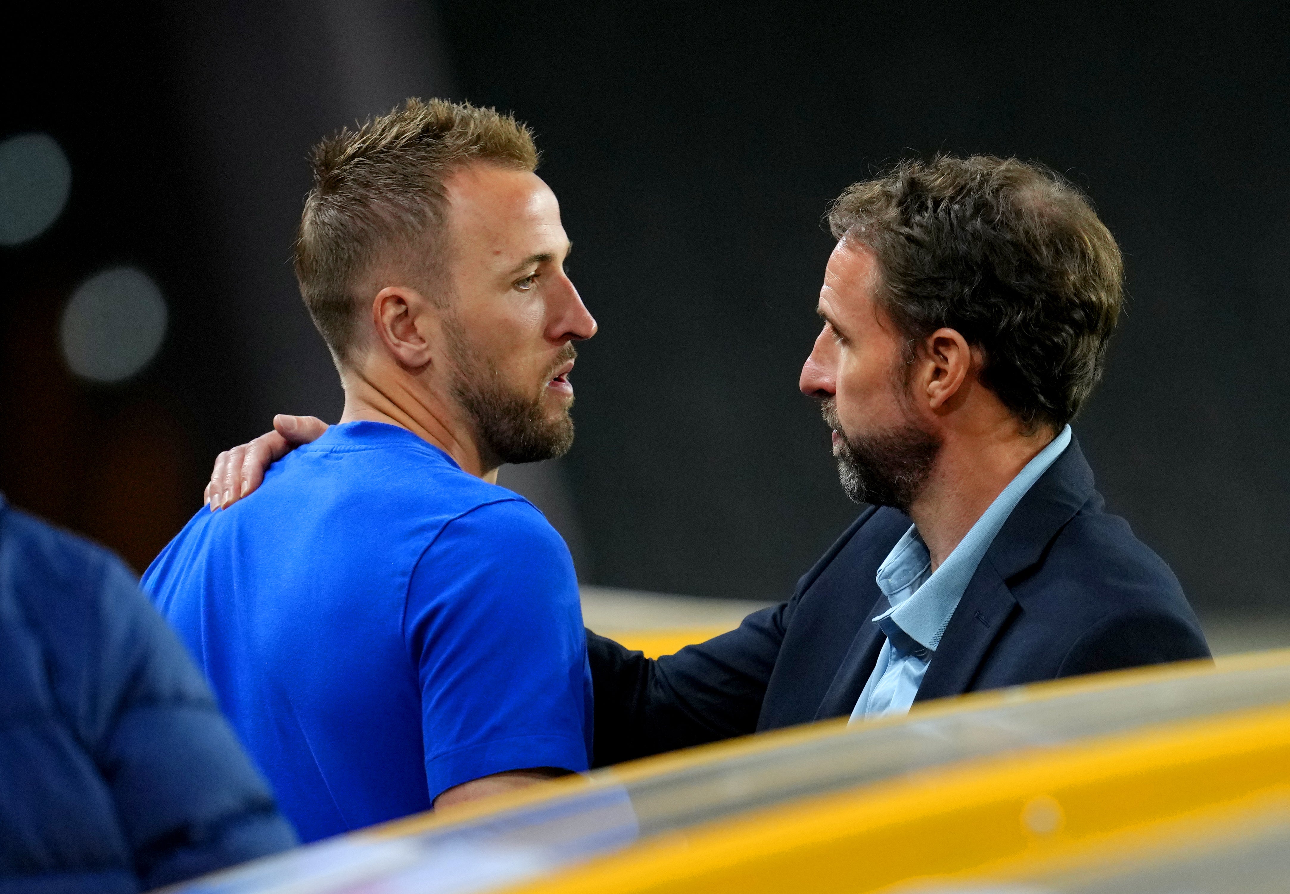 Gareth Southgate speaks to Harry Kane after the 4-0 loss to Hungary (Nick Potts/PA)