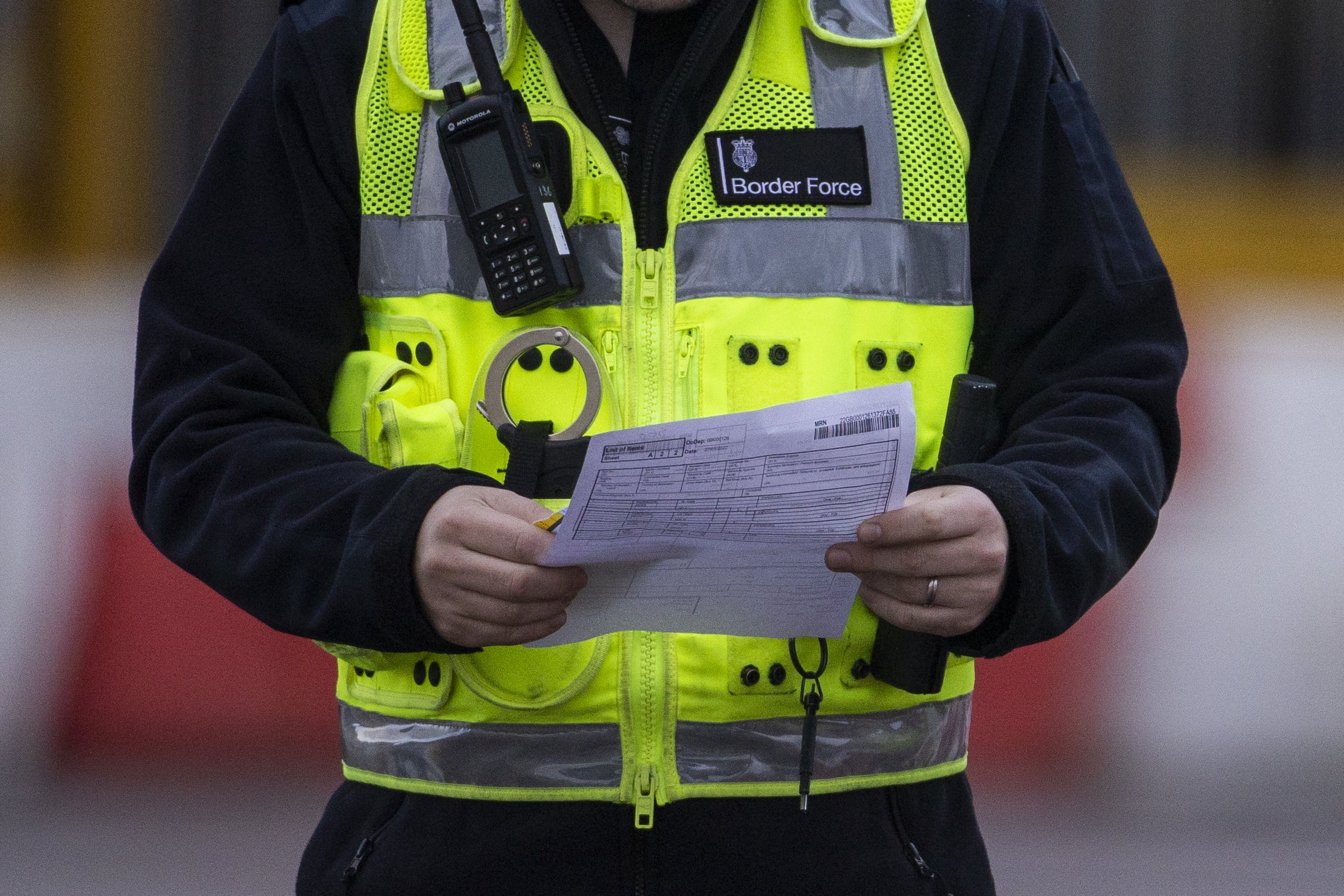 UK Border Force officers carry out checks in Belfast Port (PA)