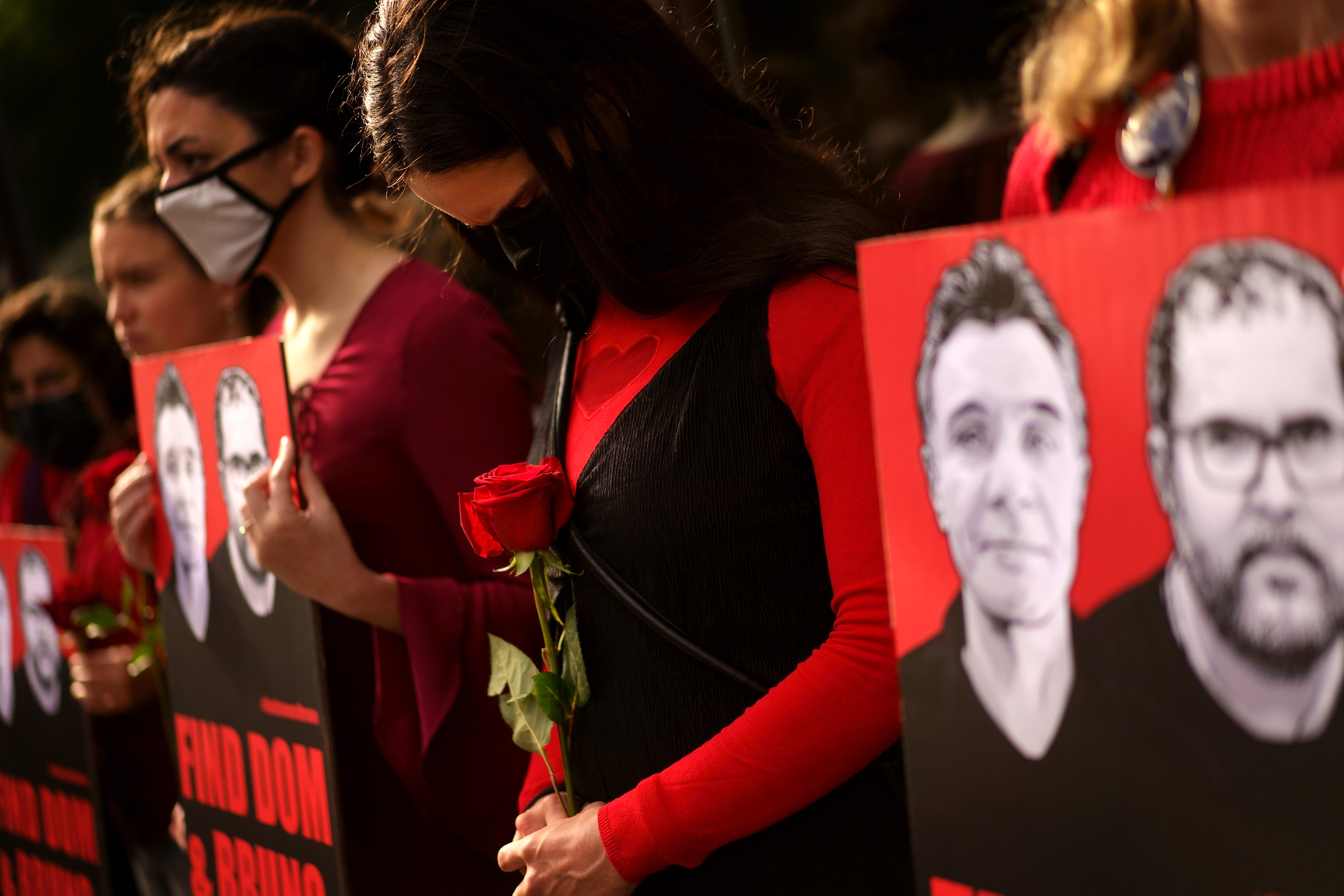 A supporter shows her emotion at a vigil outside the Brazilian Embassy in London for Dom Phillips and Bruno Araujo Pereira, a British journalist and an Indigenous affairs official who are missing in the Amazon (PA)