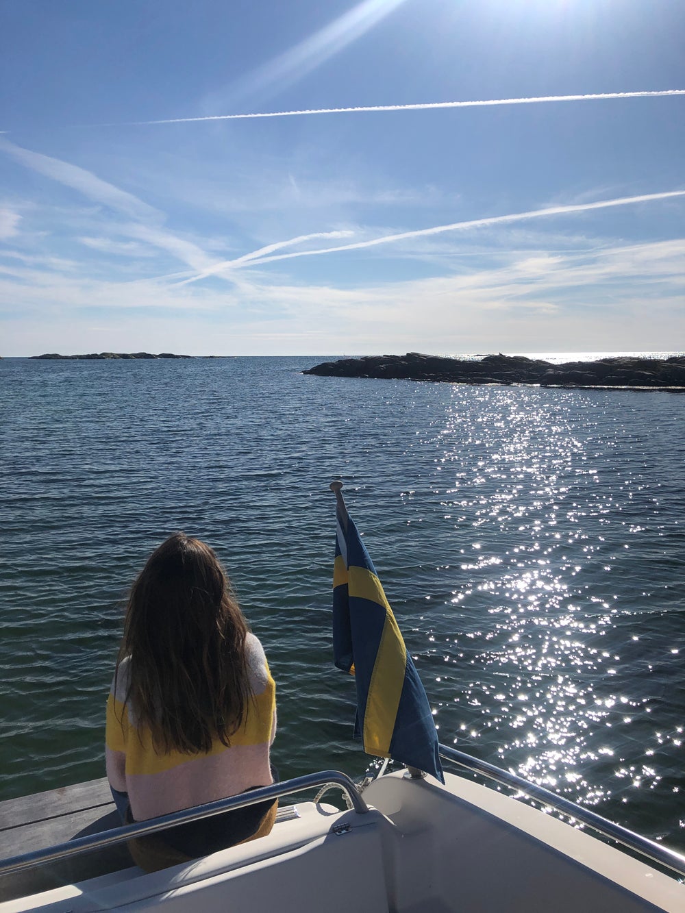 Anna on the boat after scattering Malcolm’s ashes at sea (PA Real Life/Collect)