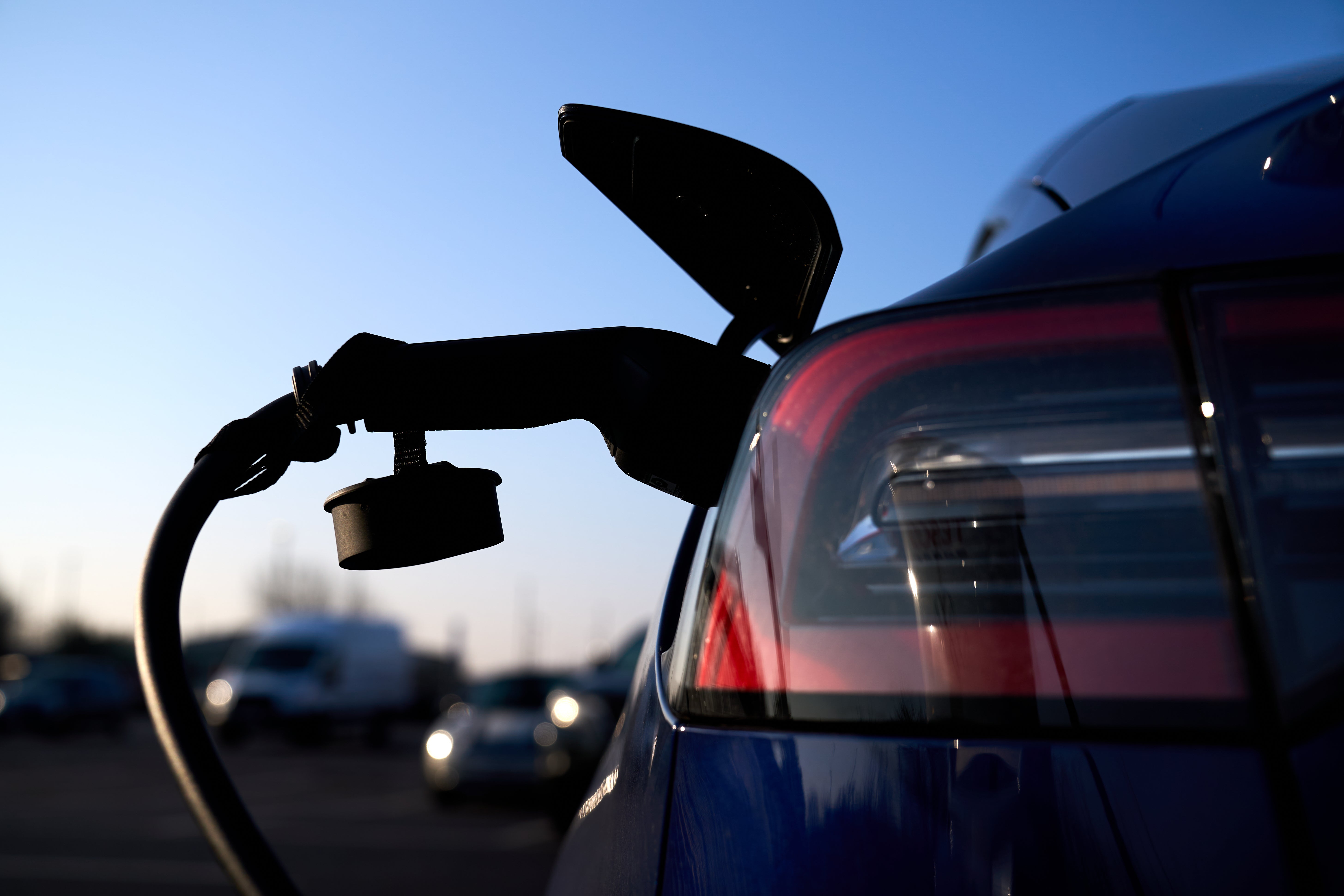 Electric car charging (John Walton/PA)