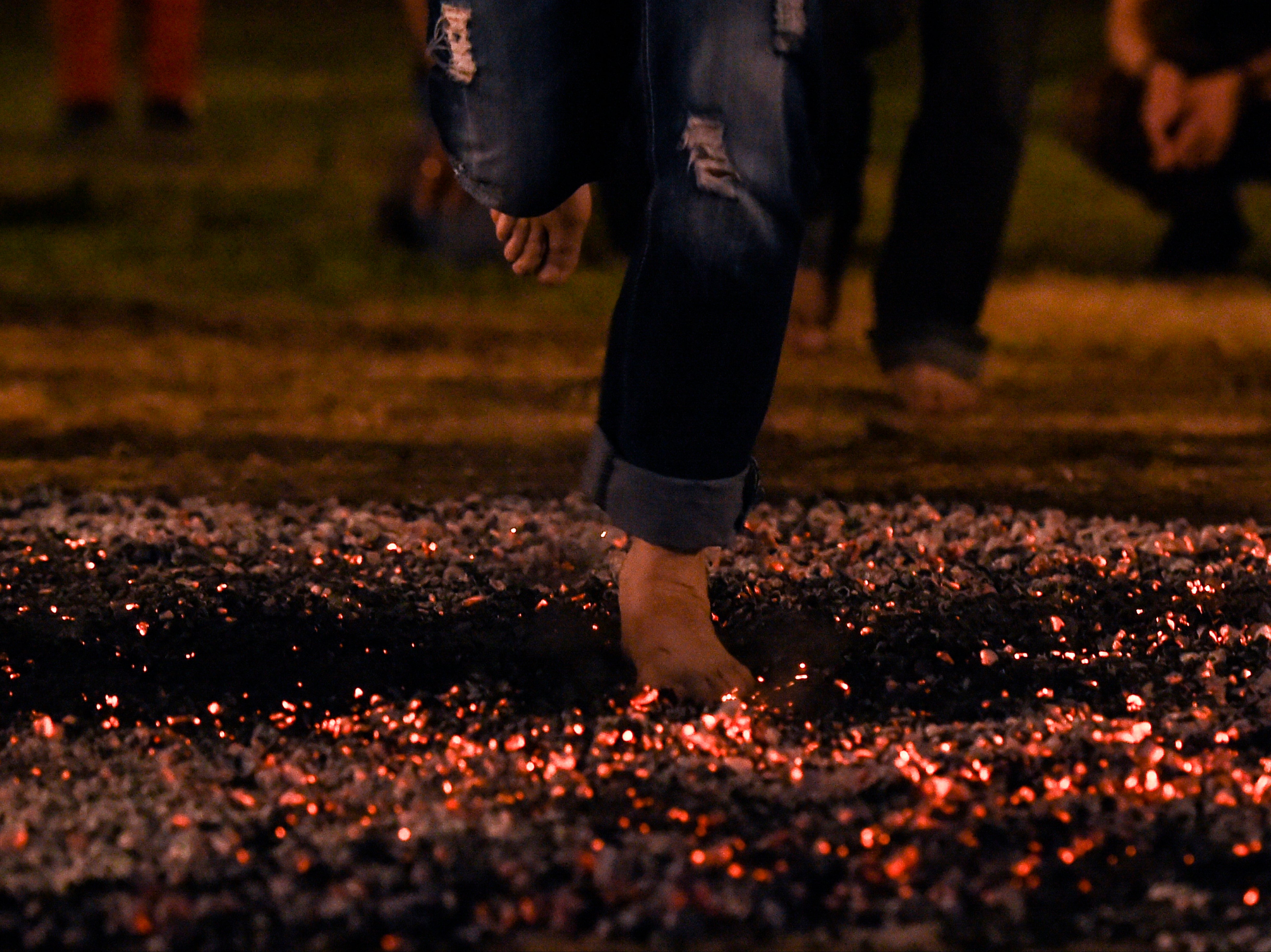 File. Dozens of employees of a Swiss company, Goldbach were injured during a private team-building ‘fire-walking' exercise