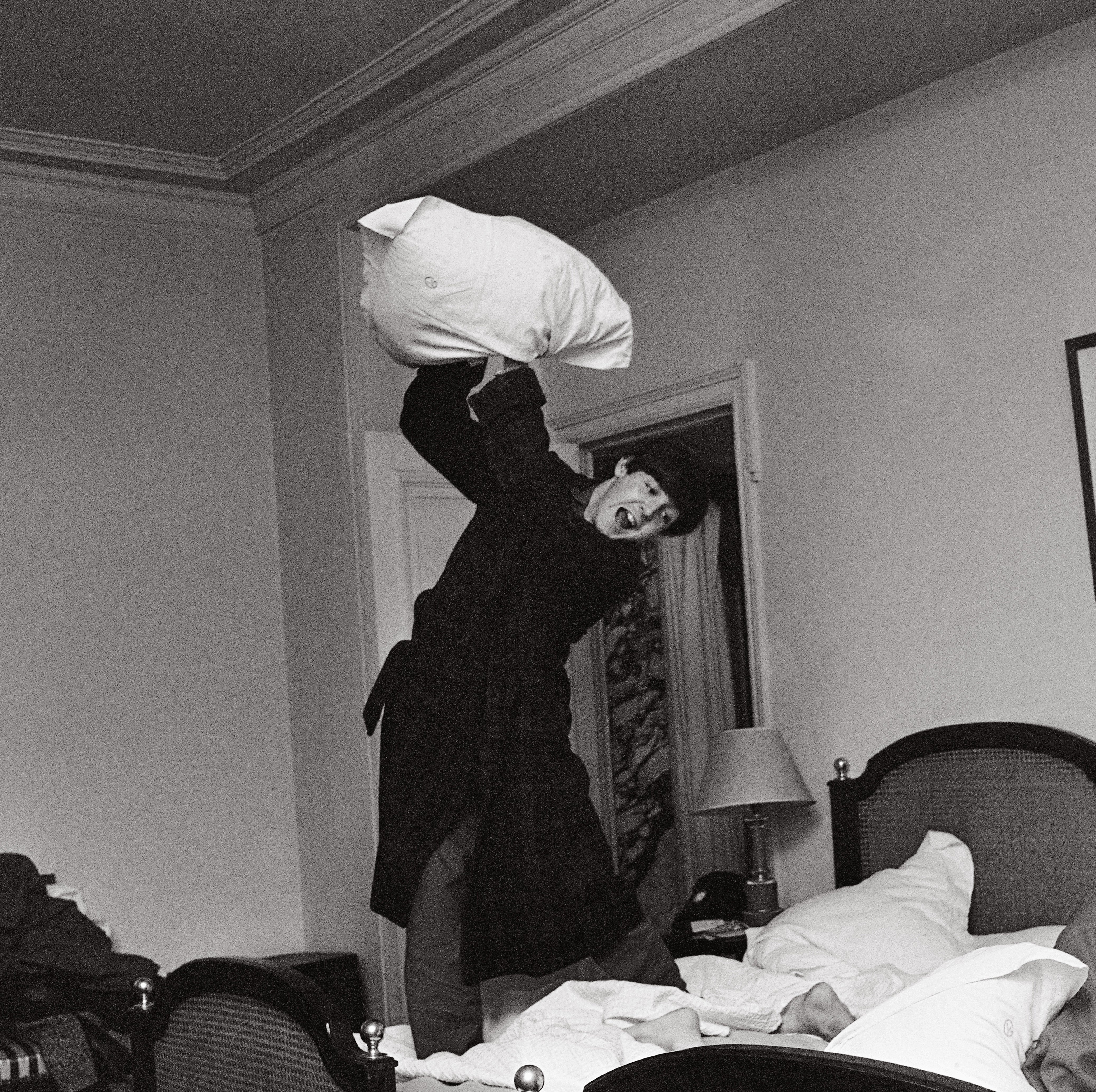 Paul during a pillow fight at the George V Hotel in Paris after a concert at the Olympia. ‘I Want to Hold Your Hand’ had just hit the American charts, 18 January 1964