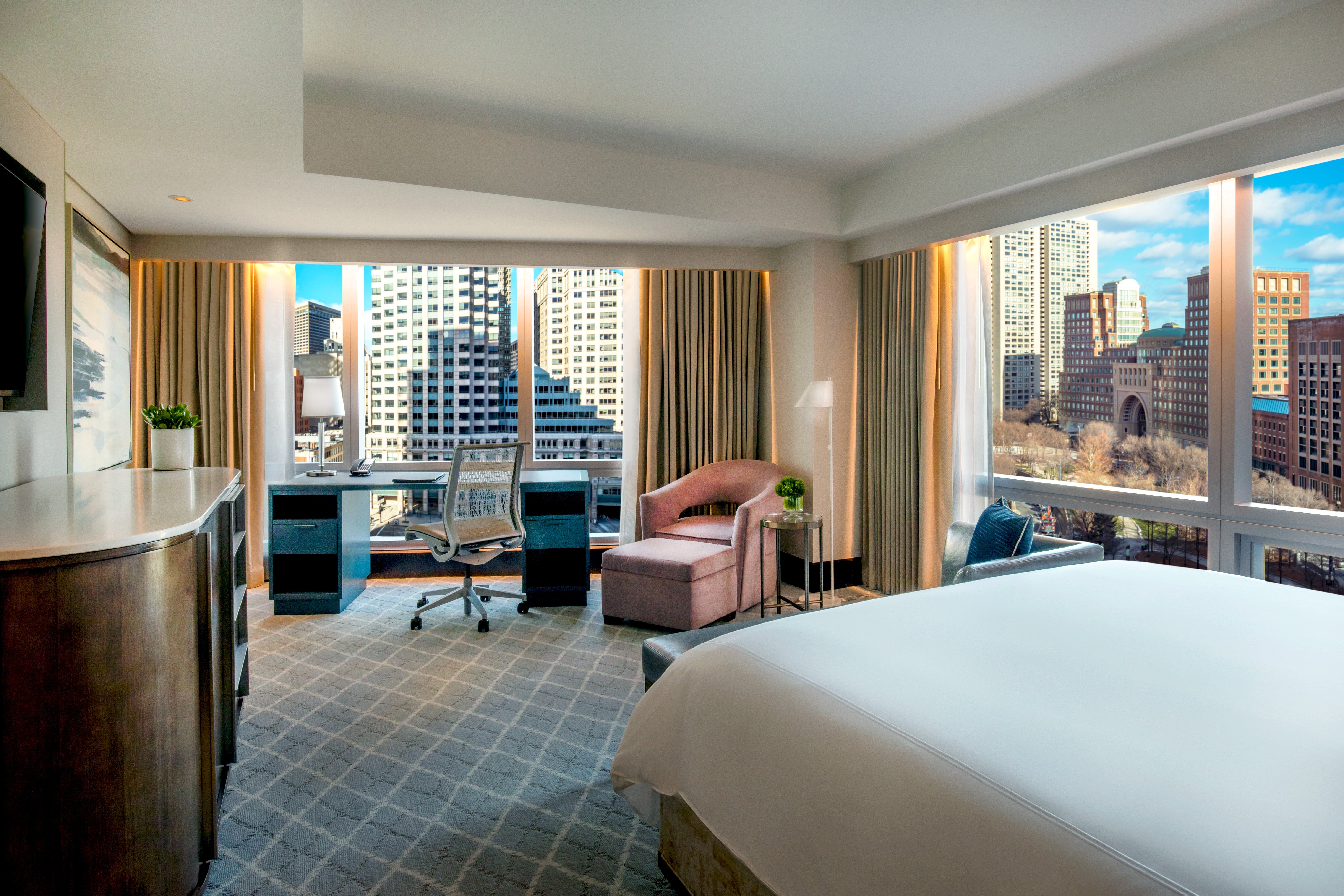 Take in the stunning skyline from your luxe suite at the InterContinental Boston