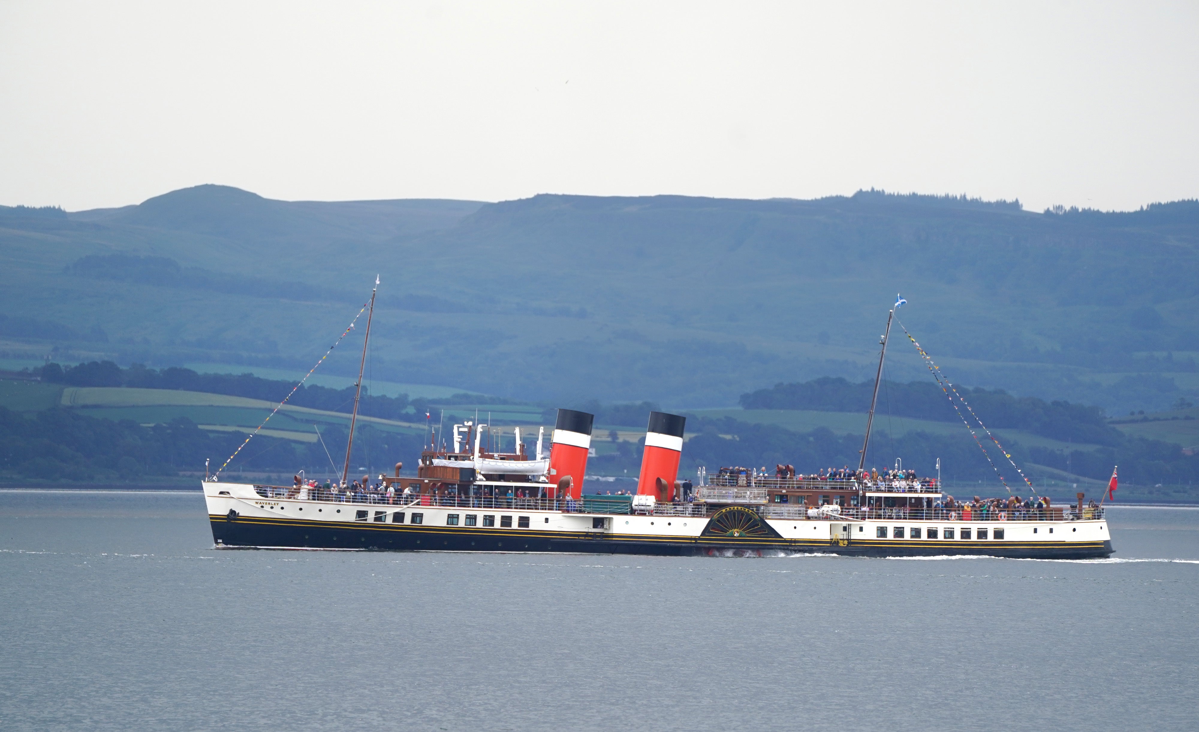 The Waverley Paddle Steamer leaves Greenock as it celebrates the 75th anniversary of its maiden voyage (Andrew Milligan/PA)