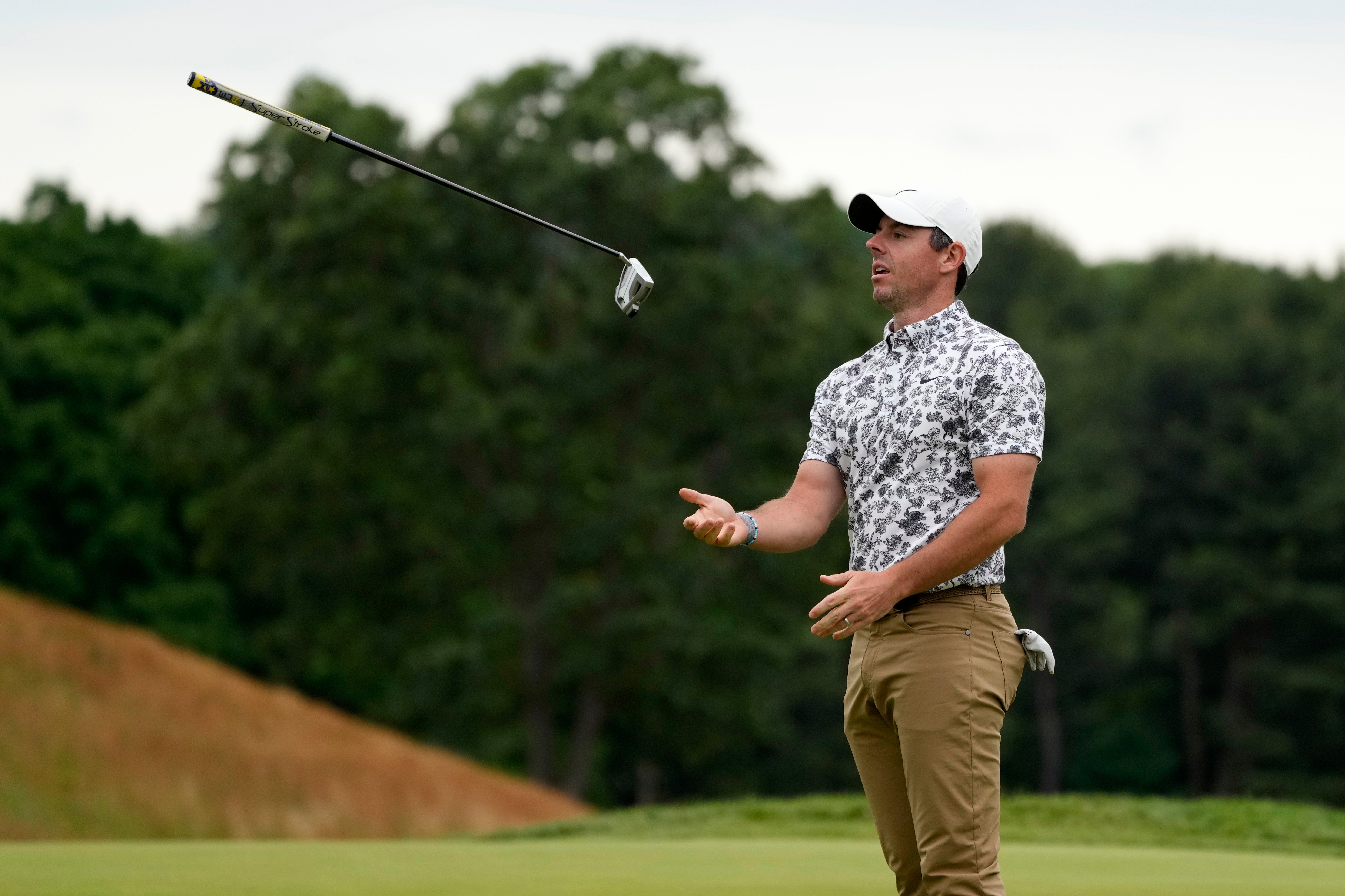 Rory McIlroy reacts after a missed putt on the sixth hole during the first round of the US Open (Charles Krupa/AP)