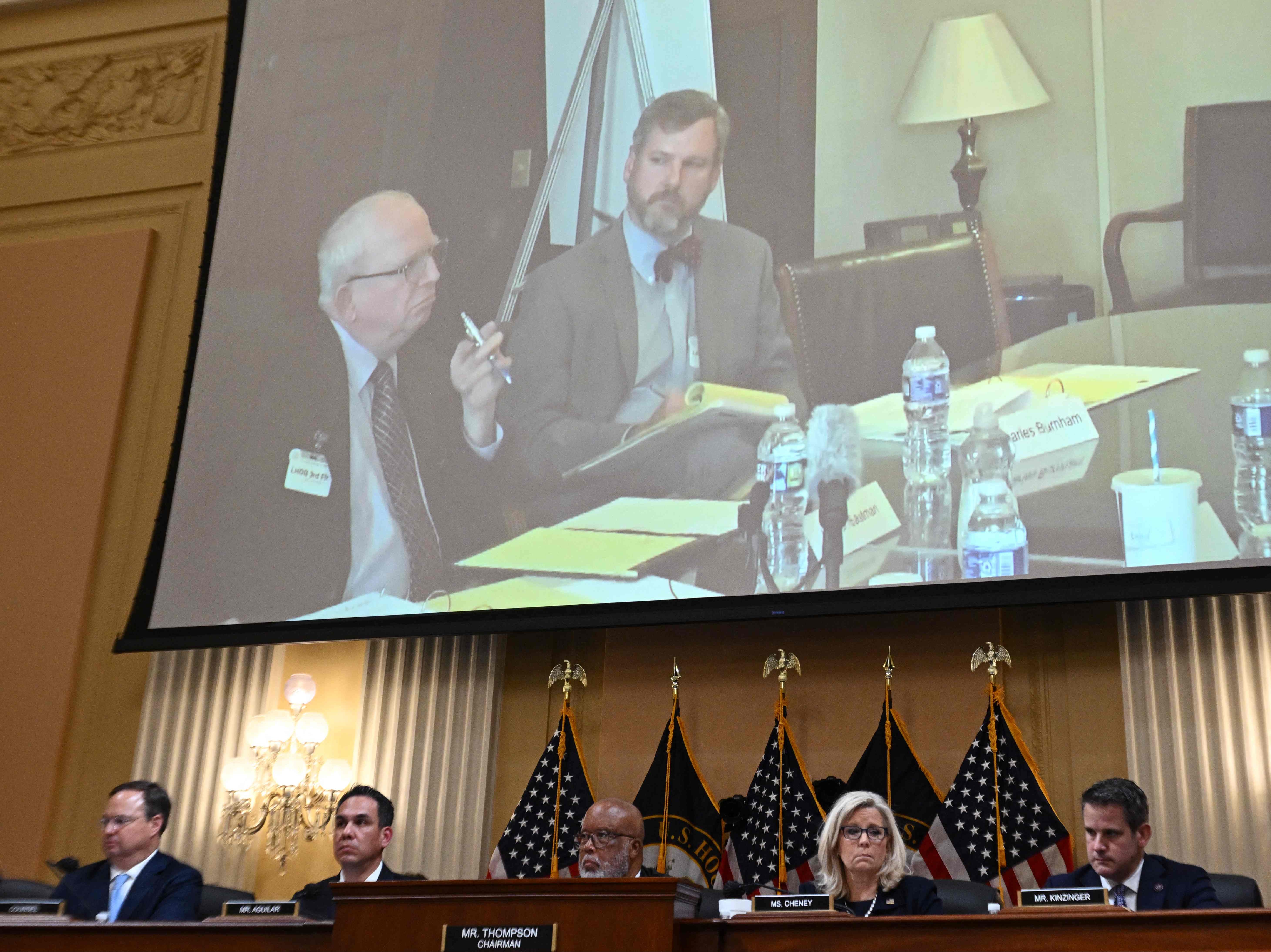 Trump lawyer John Eastman is shown on a screen during the third hearing on 16 June