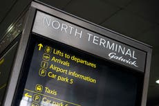 Passengers wait on planes and in airport for up to six hours as torrential rain hits Gatwick