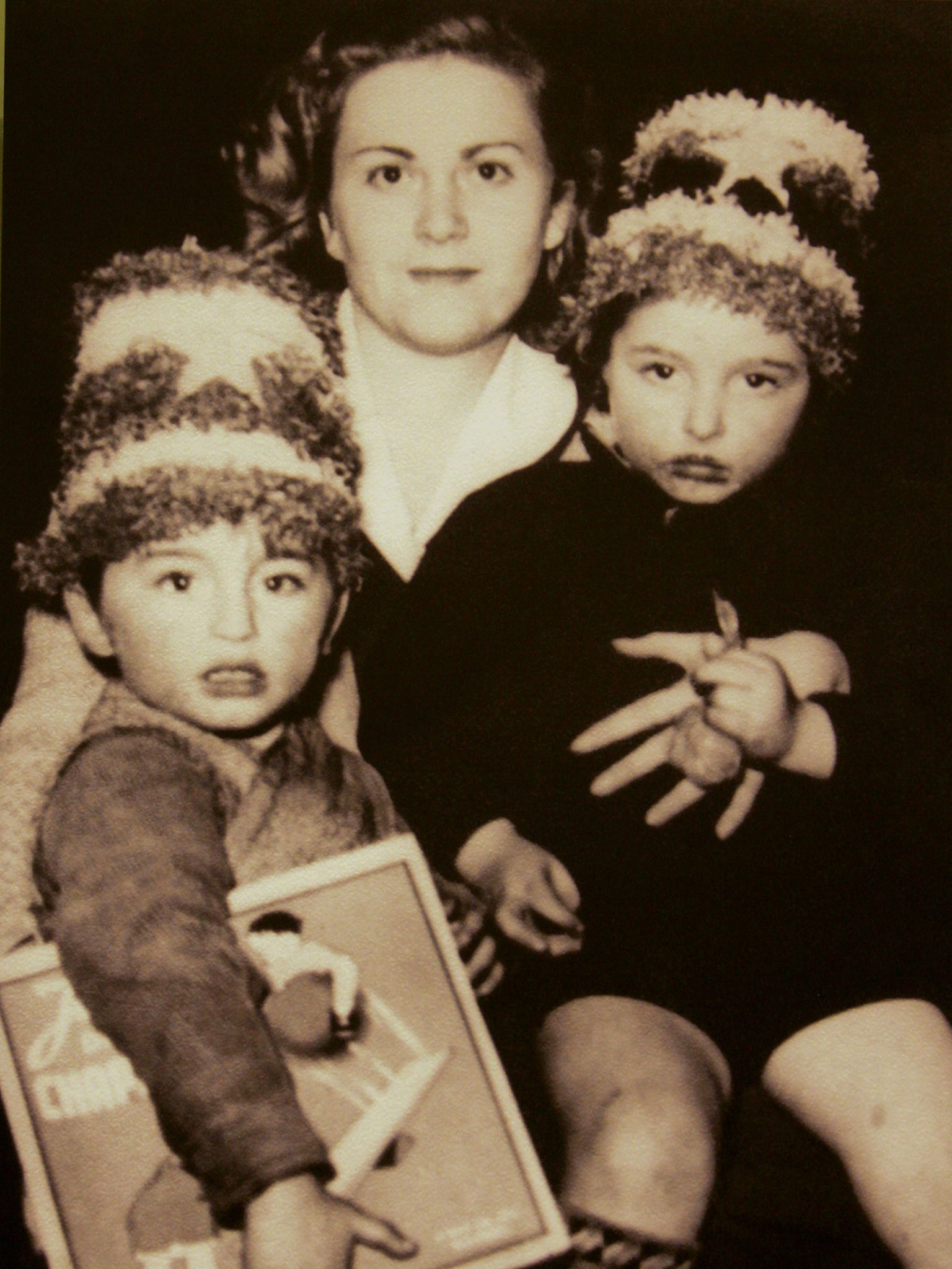 Geulen holding two Belgian Jewish children she hid and saved during the Second World War