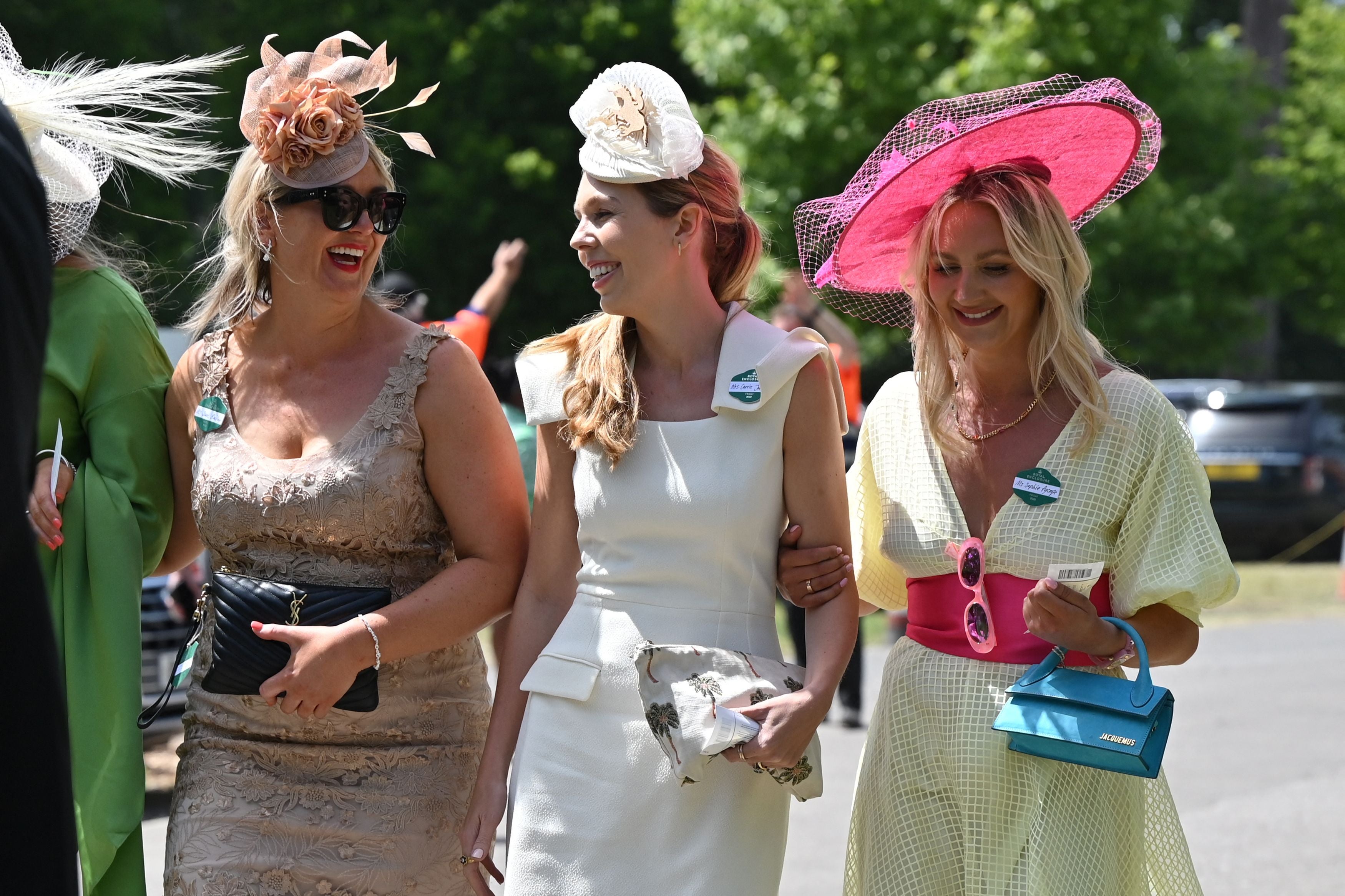 Carrie Johnson, wife of Britain’s PM Boris Johnson, beams at Royal Ascot in a sleeveless midi-dress