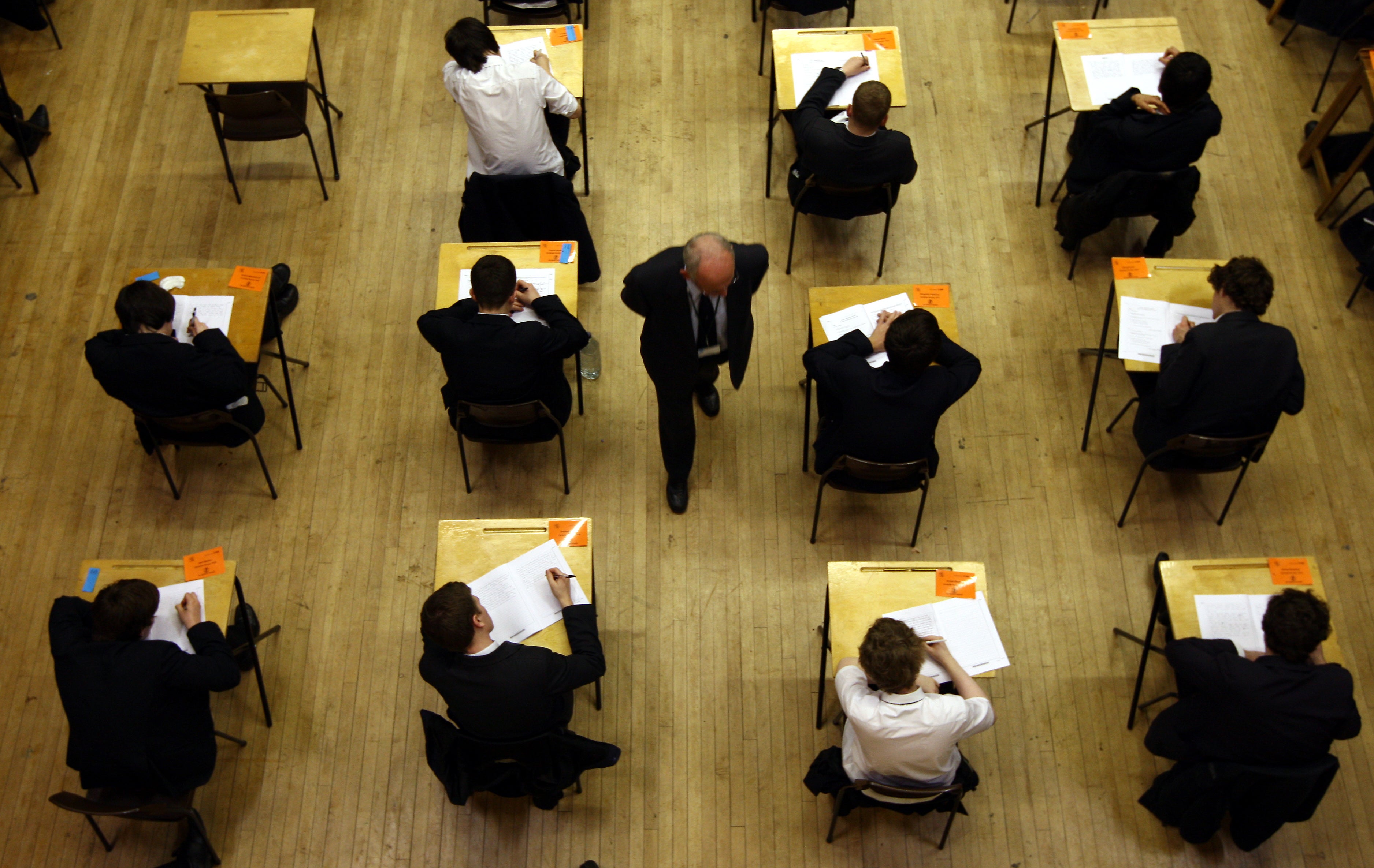 Pupils sitting exams (David Jones/PA)