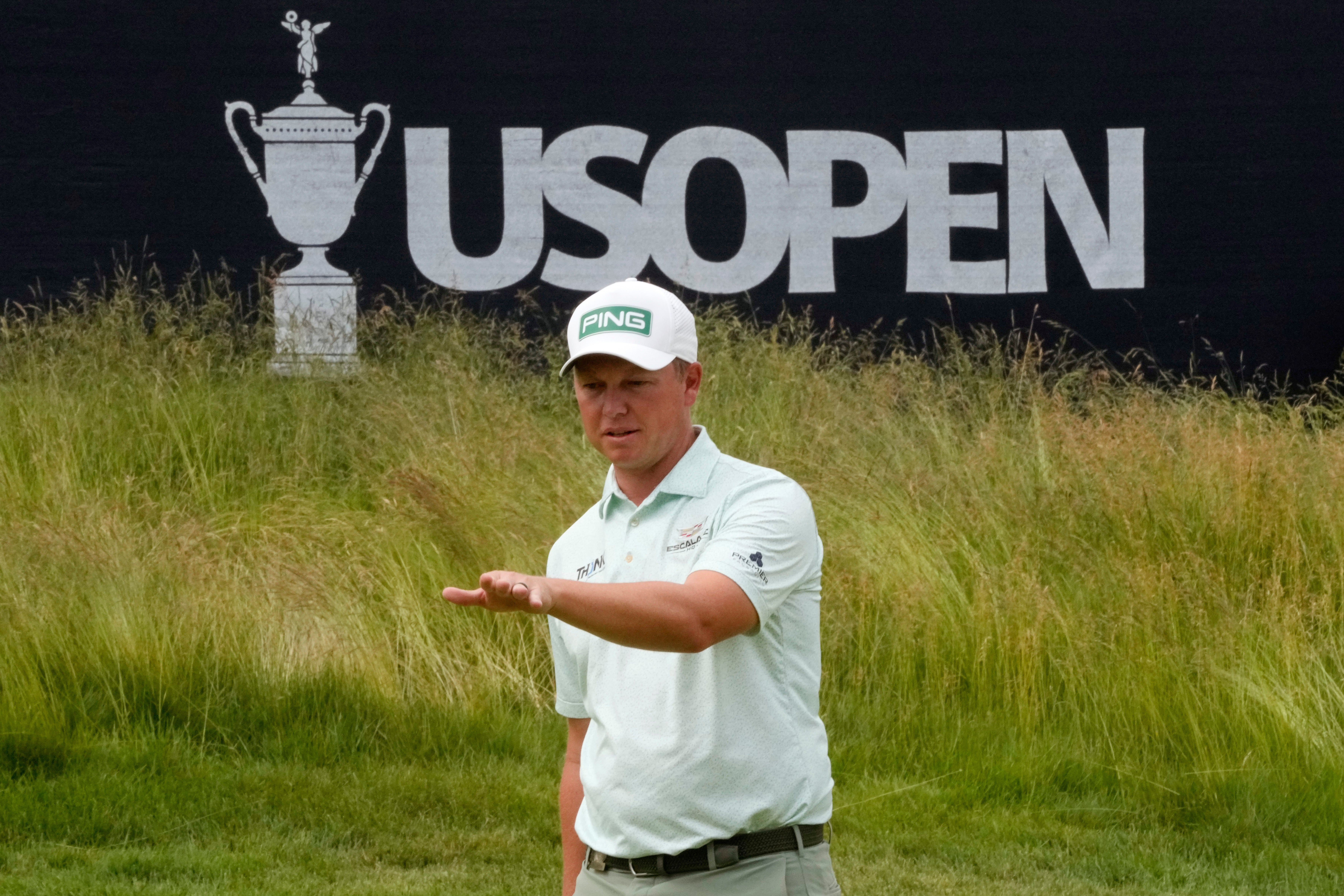 MJ Daffue prepares to putt on the 12th hole during the second round of the US Open (Charles Krupa/AP)