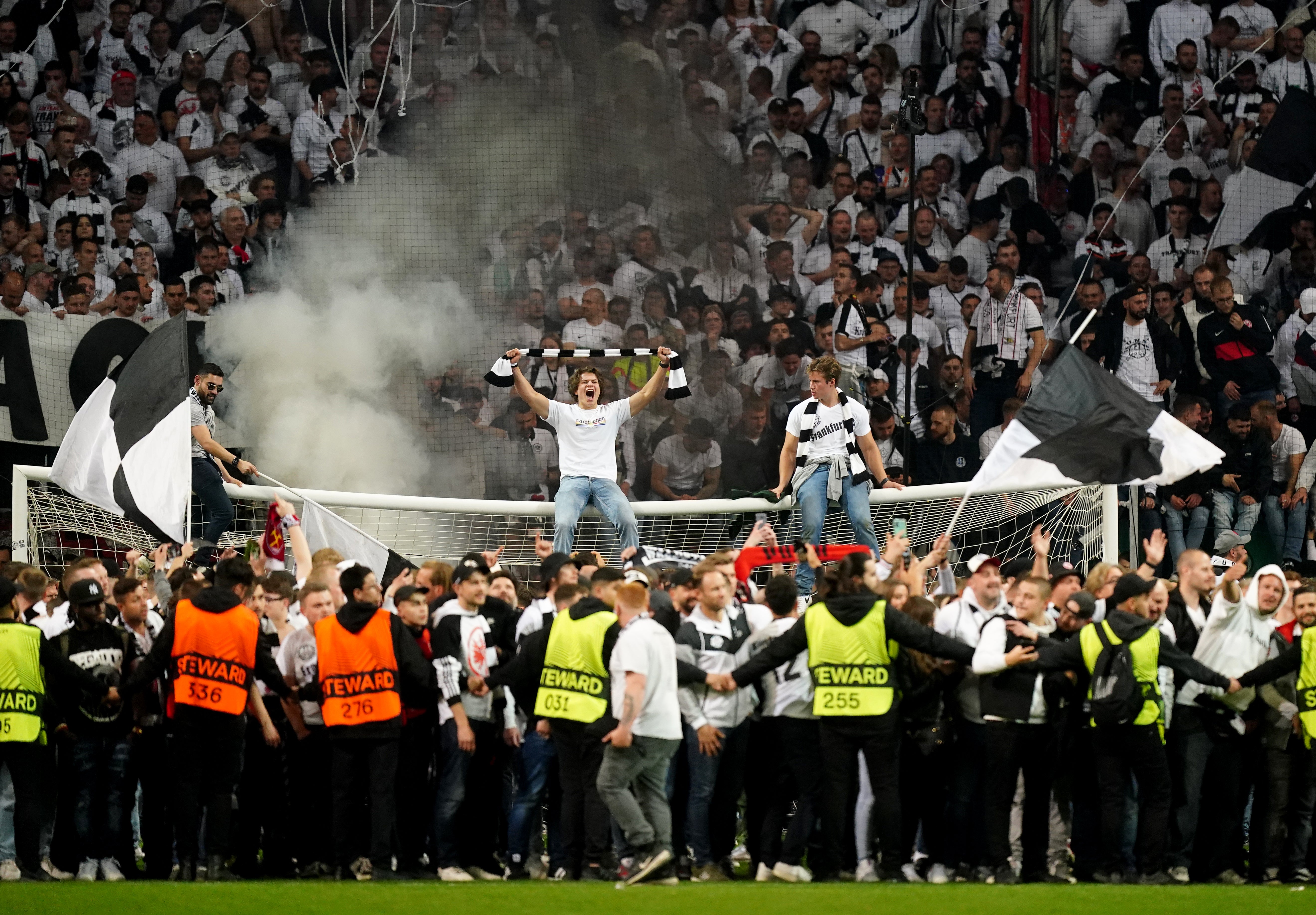 Eintracht Frankfurt fans invaded the pitch after their side’s second-leg win against West Ham (Mike Egerton/PA)