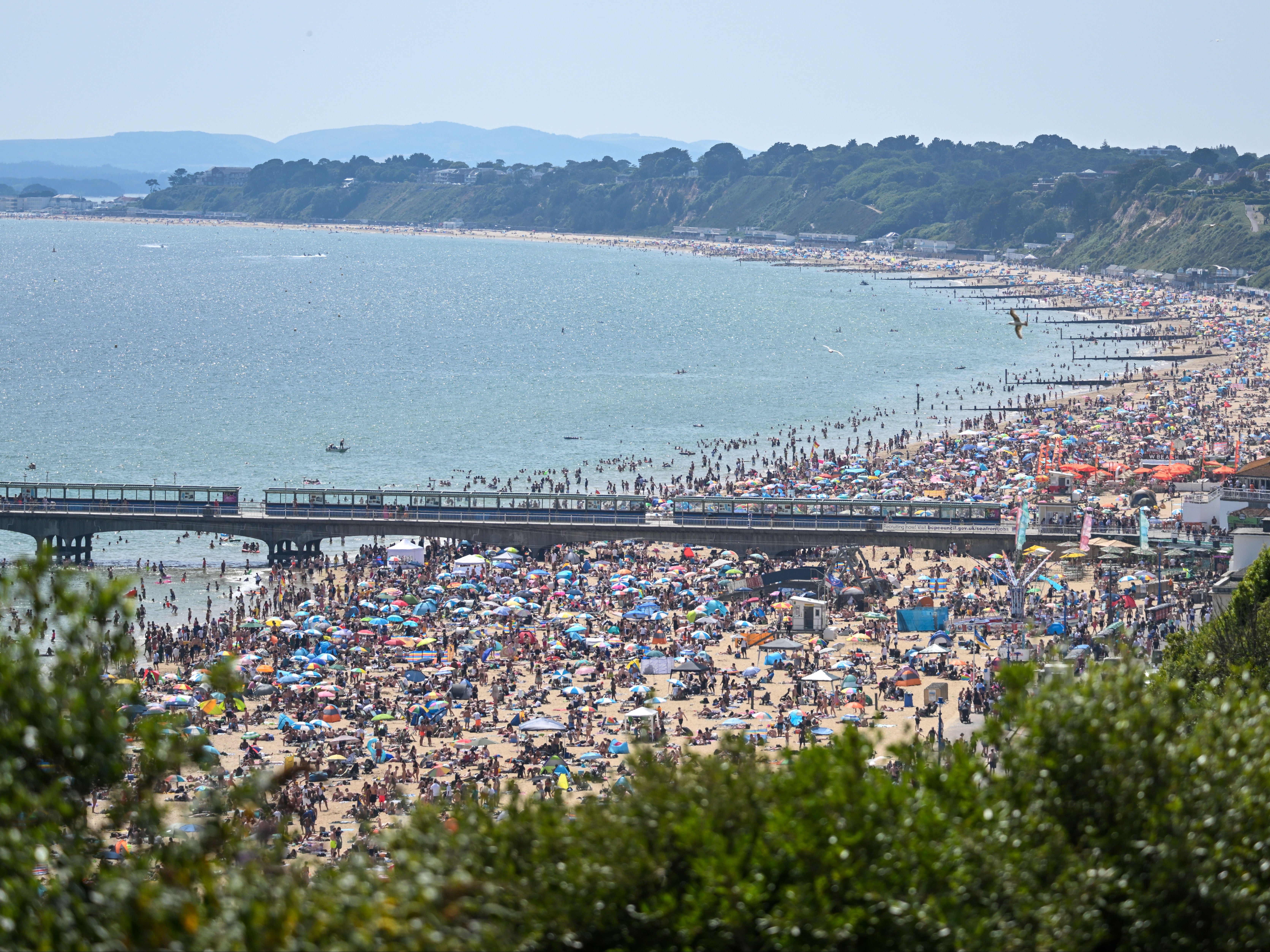 Crowds flocked to Bournemouth beach as UK saw hottest day of year so far in June