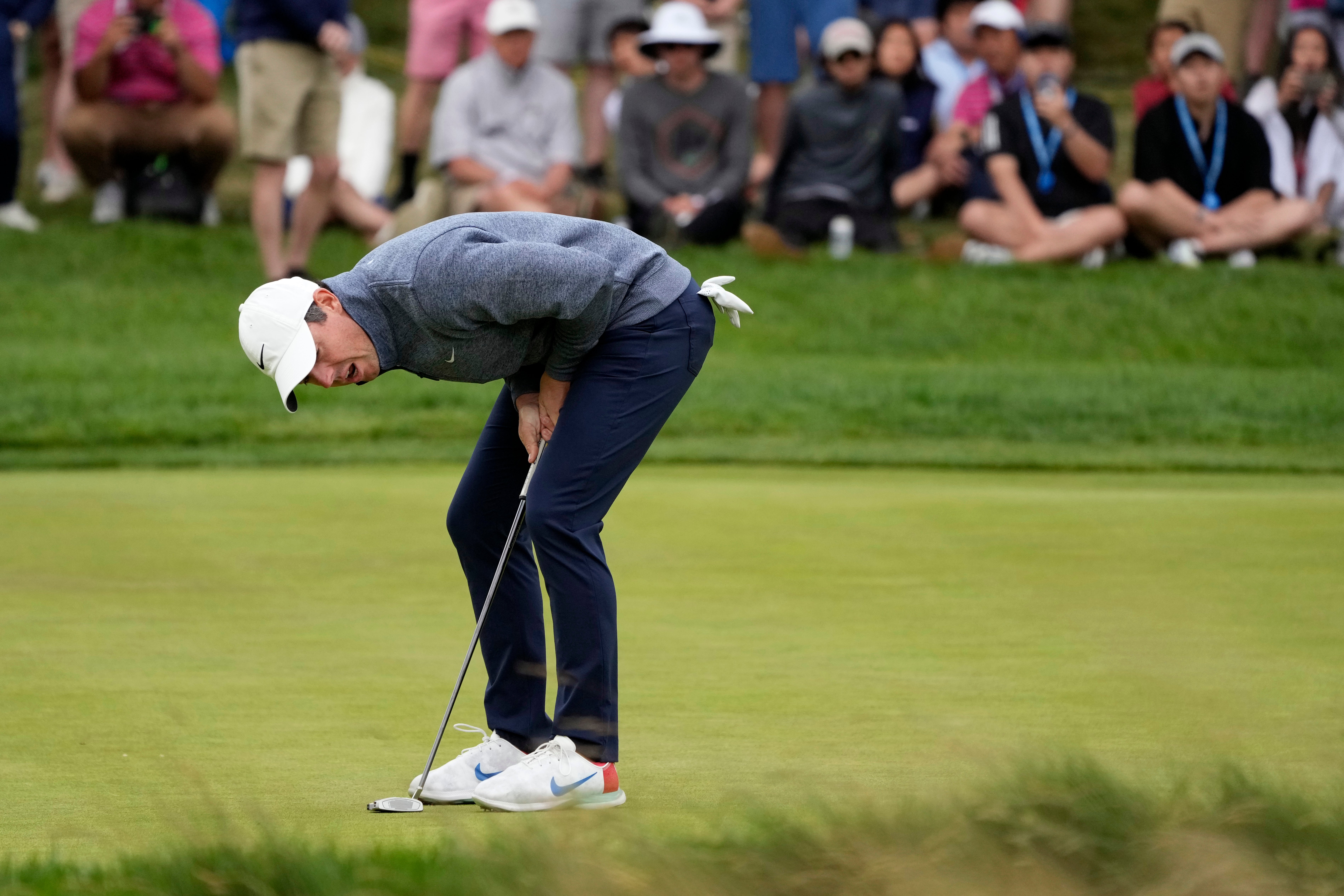 Rory McIlroy missed a putt on the fourth hole during the third round of the US Open (Charles Krupa/AP)