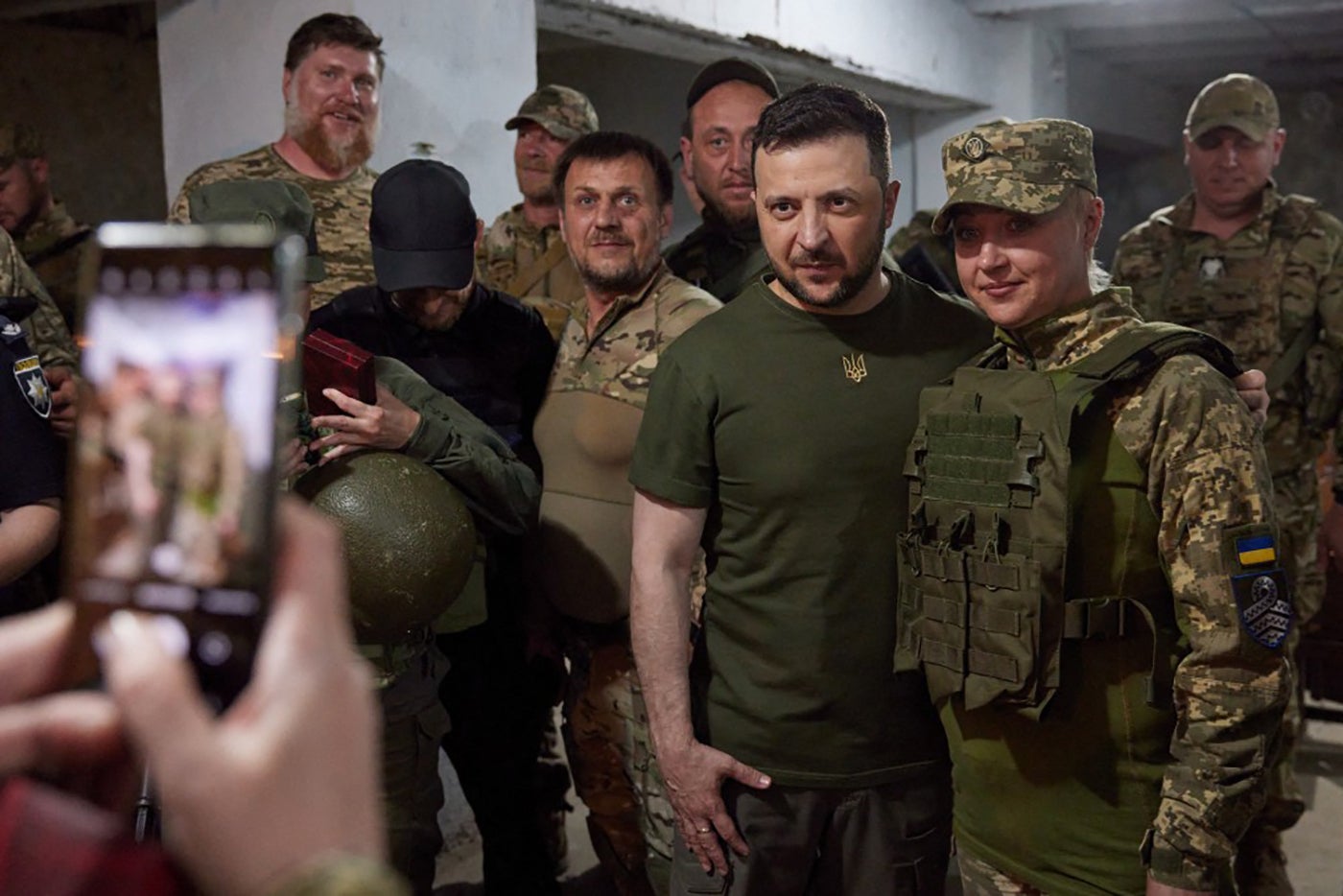 ‘As long as you live, there is a strong Ukraininan wall that protects our country,’ President Zelensky told troops during his visit