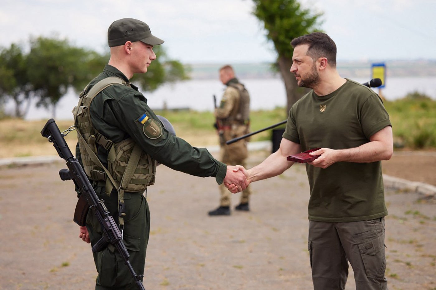 Zelensky’s Telegram account showed the president handing out medals and posing for selfies with the troops