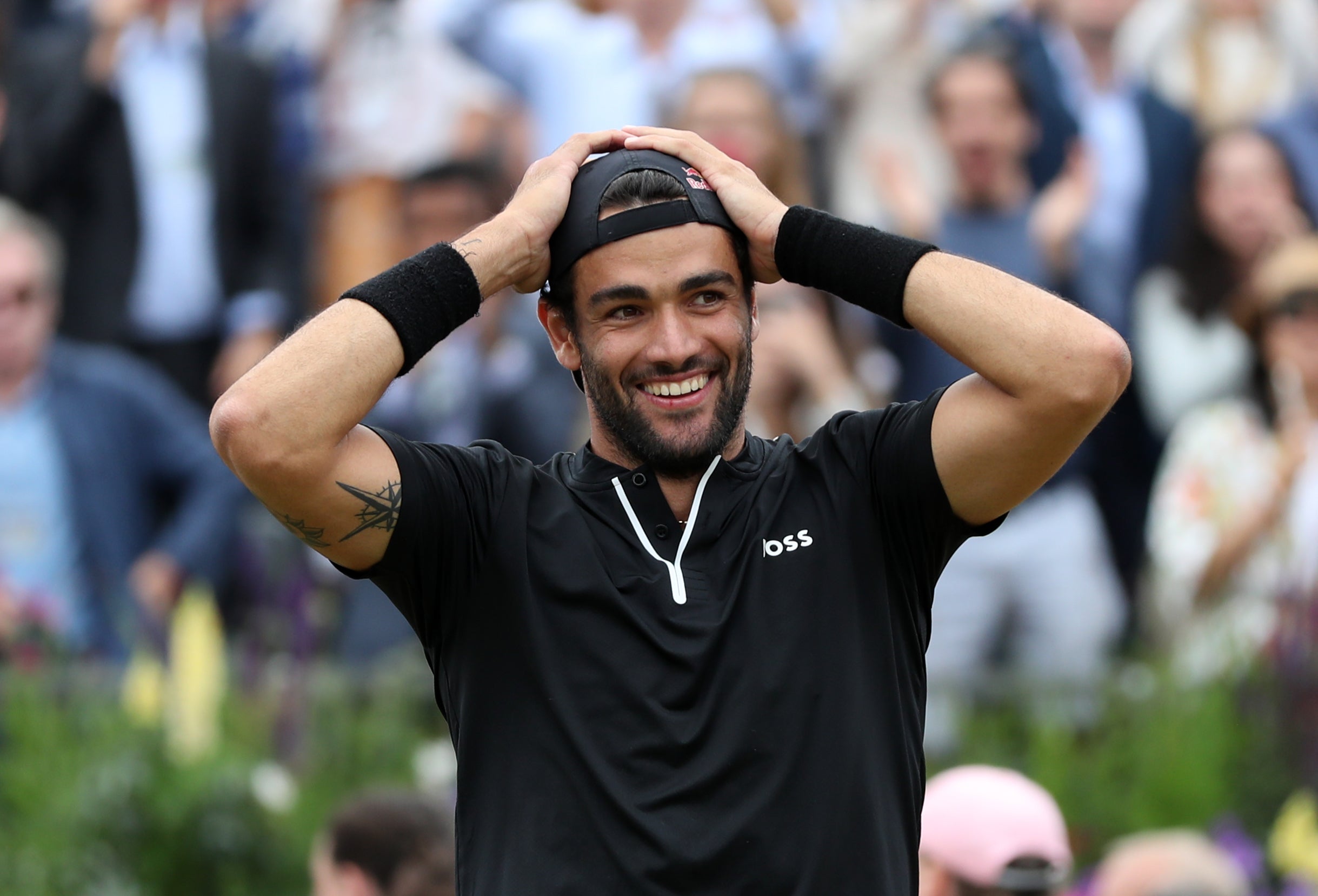 Hats off to him... the Italian player joins the likes of Andy Murray and John McEnroe in being able to retain his crown