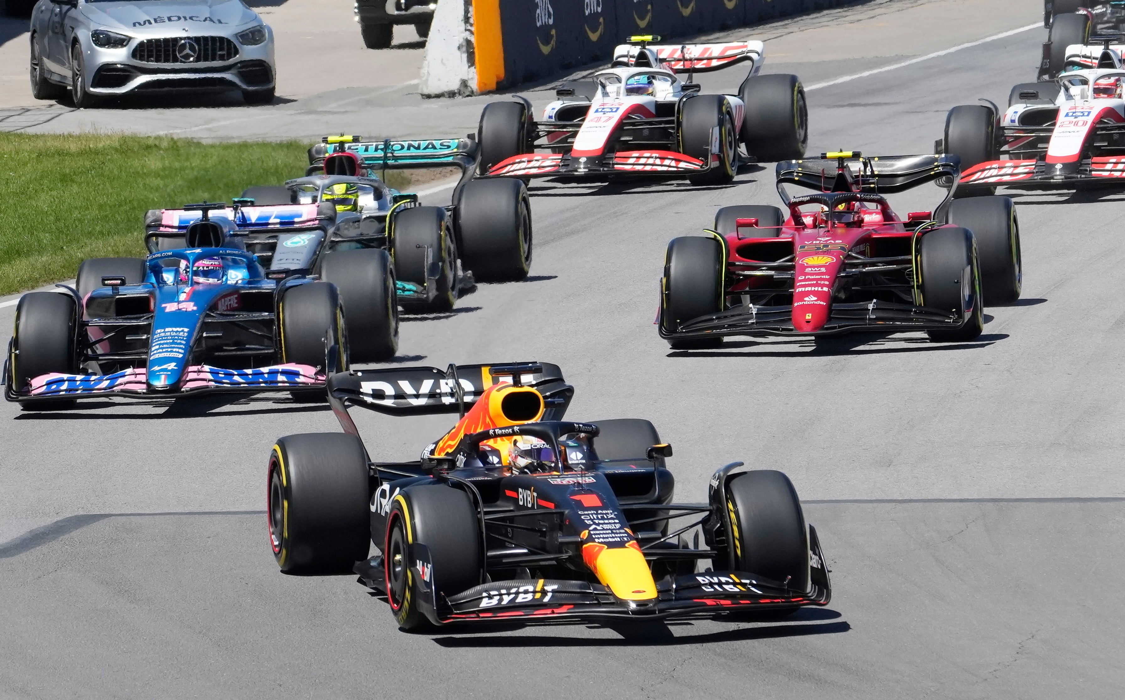 Max Verstappen leads on the first corner after the start