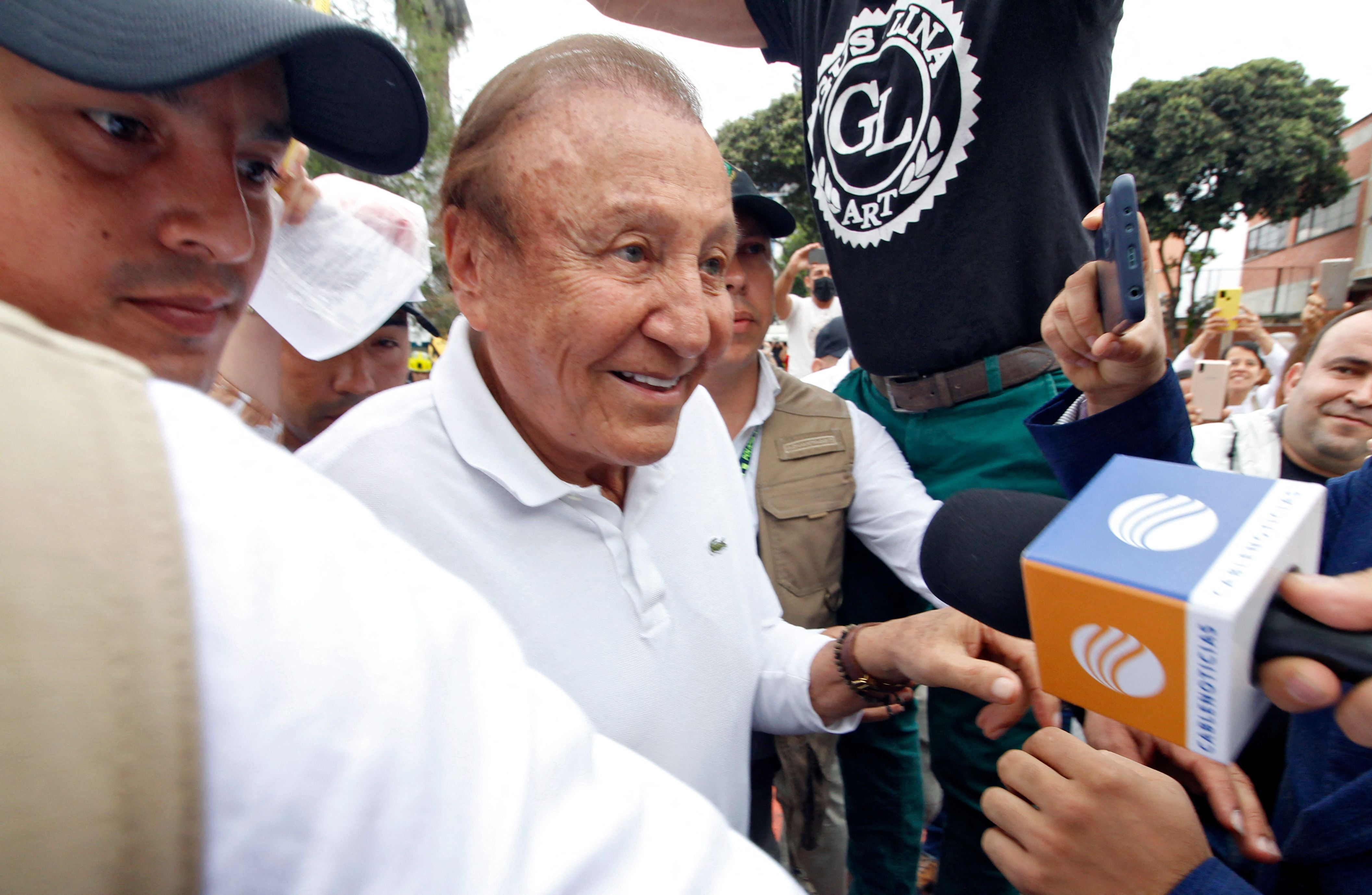 Rodolfo Hernandez arrives at a polling station to cast his vote during the presidential runoff election in Bucaramanga