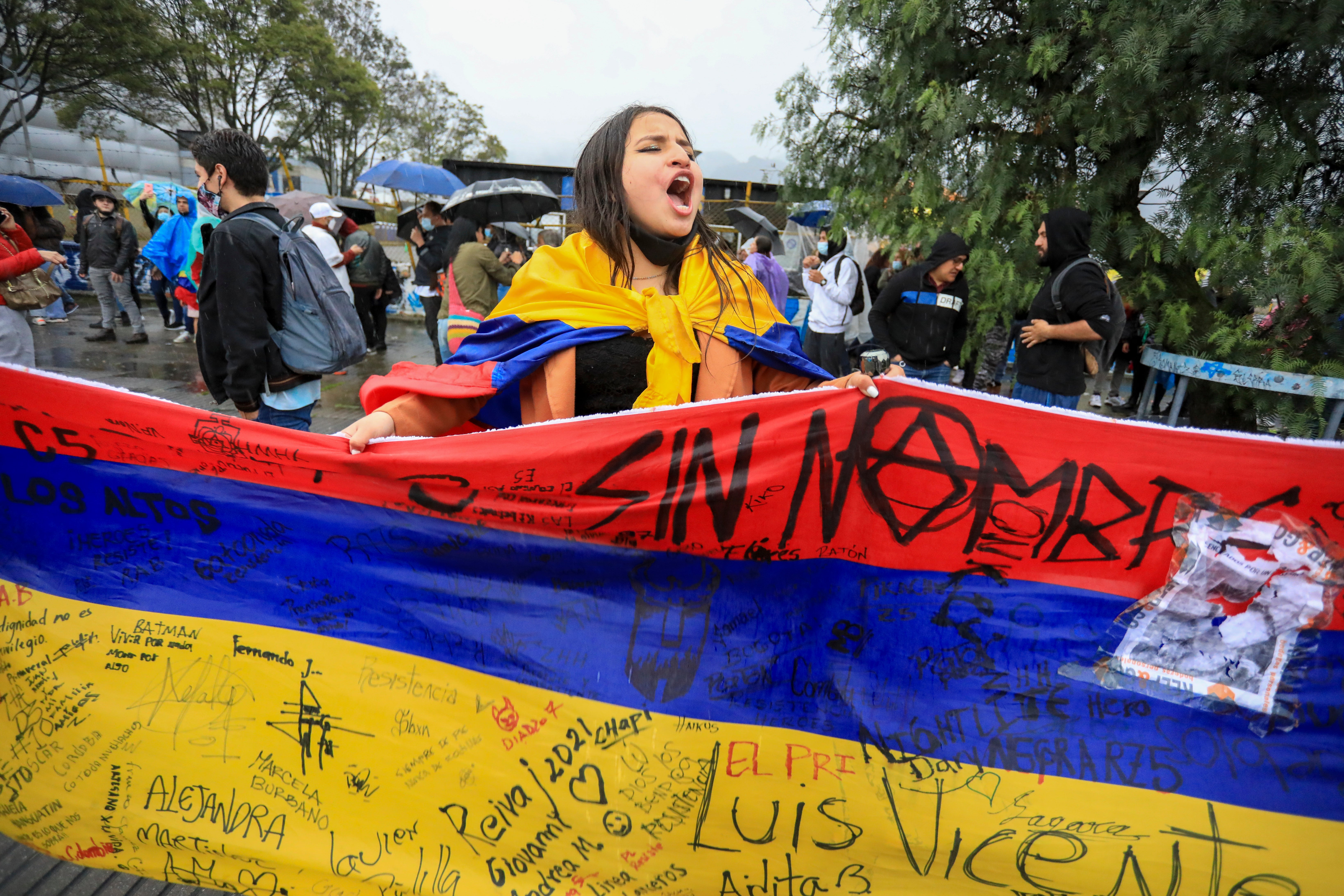 Supporters of presidential candidate Gustavo Petro celebrate after he won a presidential runoff in Bogota