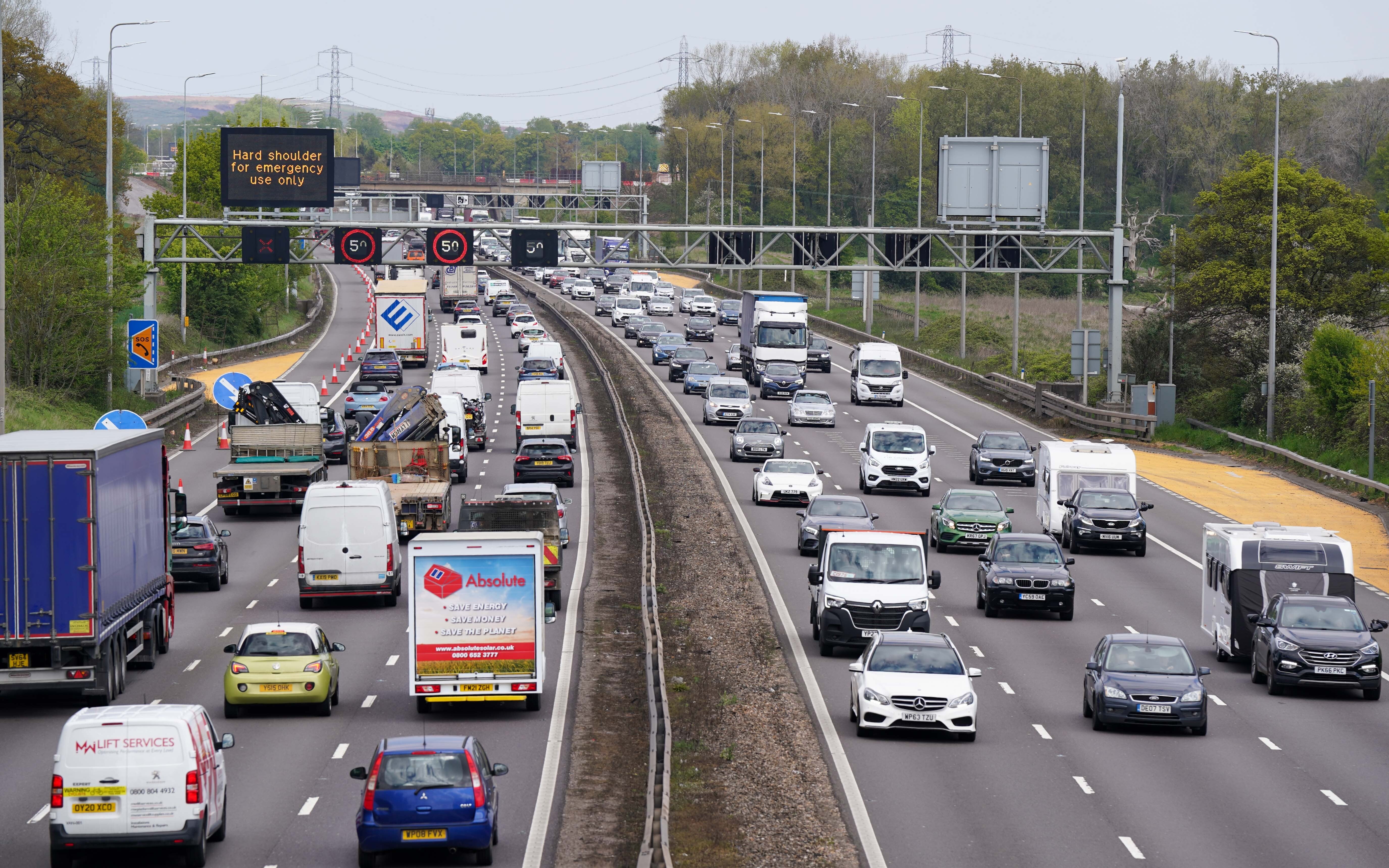 Motorists are being warned to expect a surge in traffic as train passengers switch to road transport during the rail strikes (Jacob King/PA)