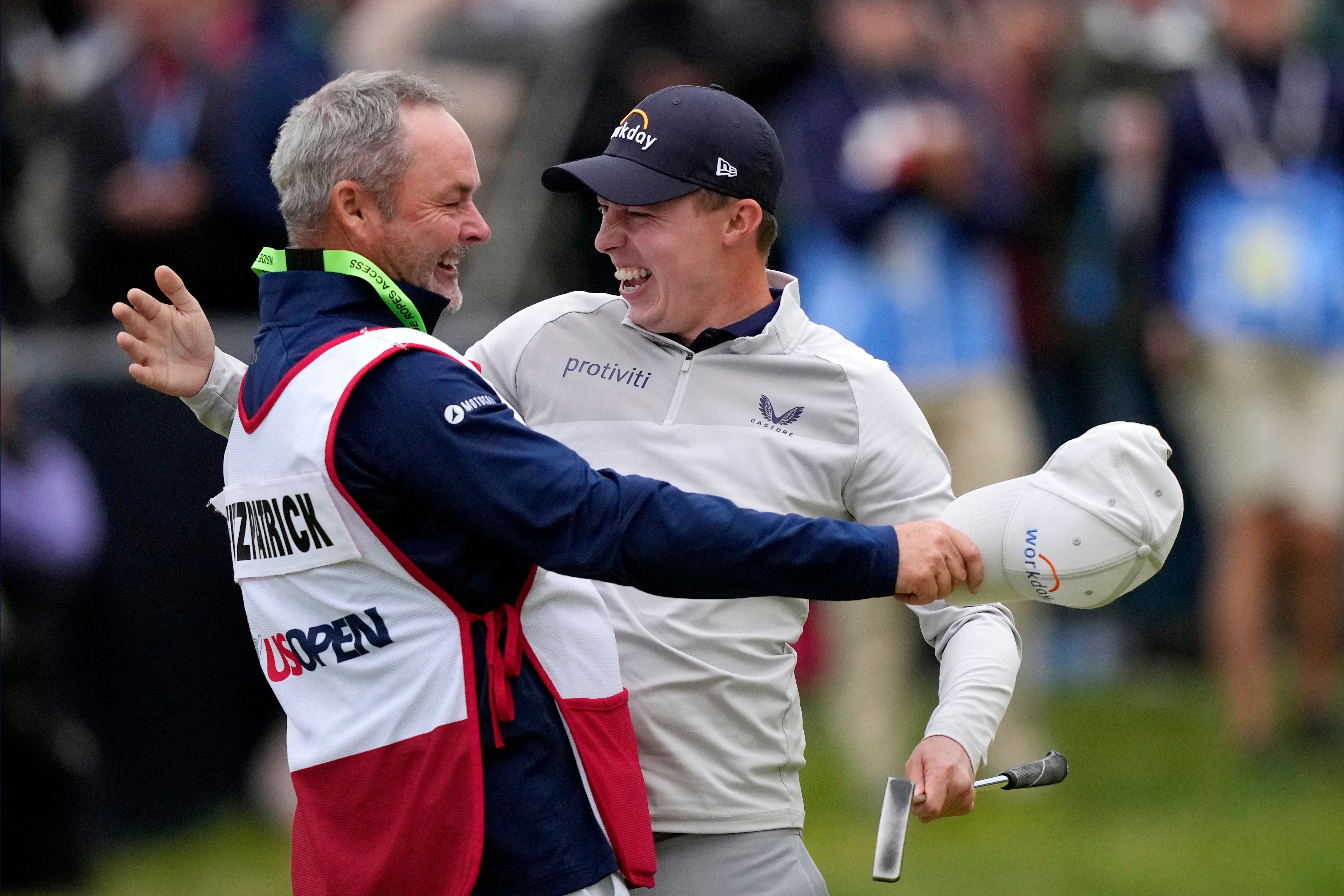 Matt Fitzpatrick celebrates with his caddie Billy Foster after winning the US Open (Robert F Bukaty/AP)