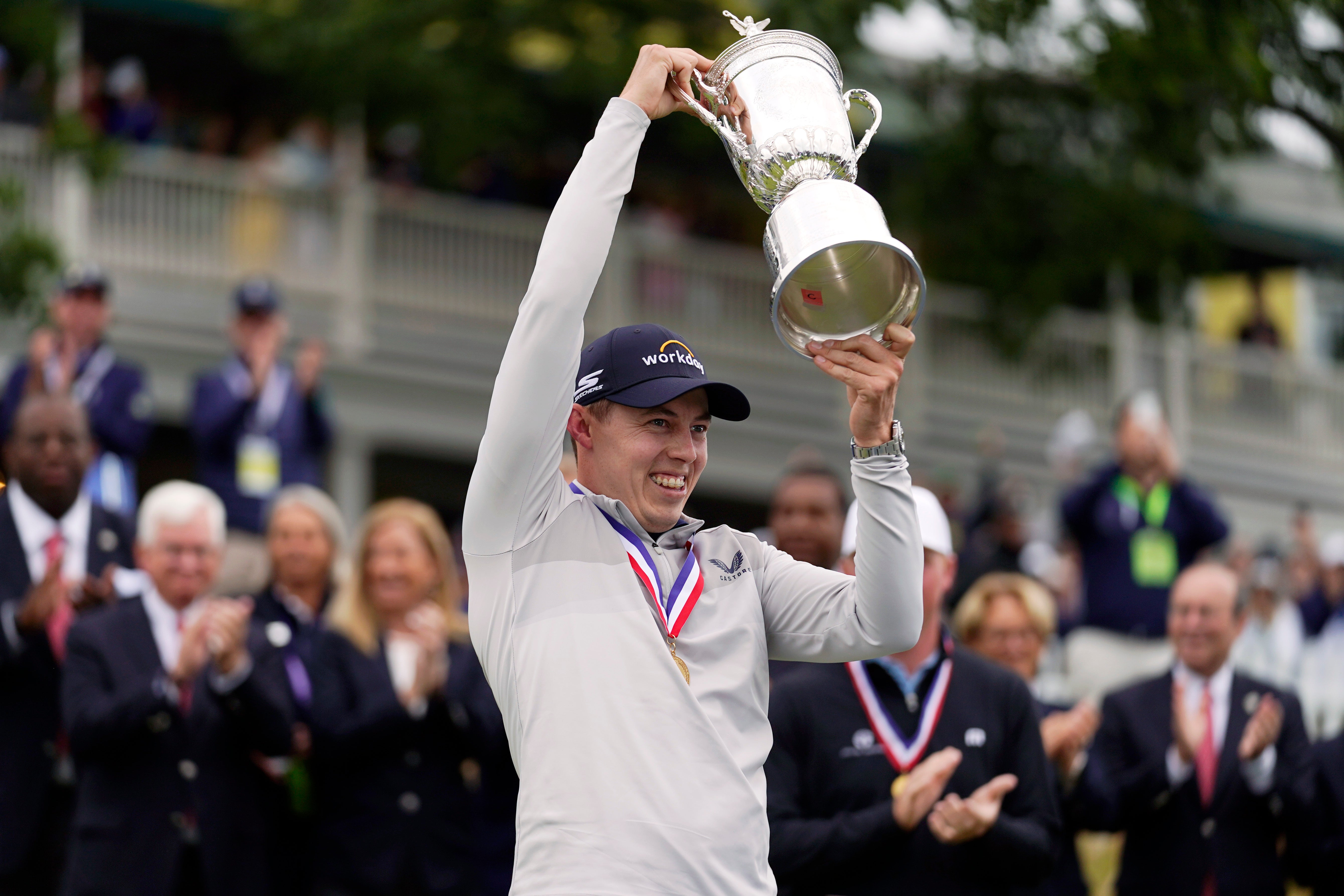 Matt Fitzpatrick lifts the US Open trophy (Charles Krupa/AP)