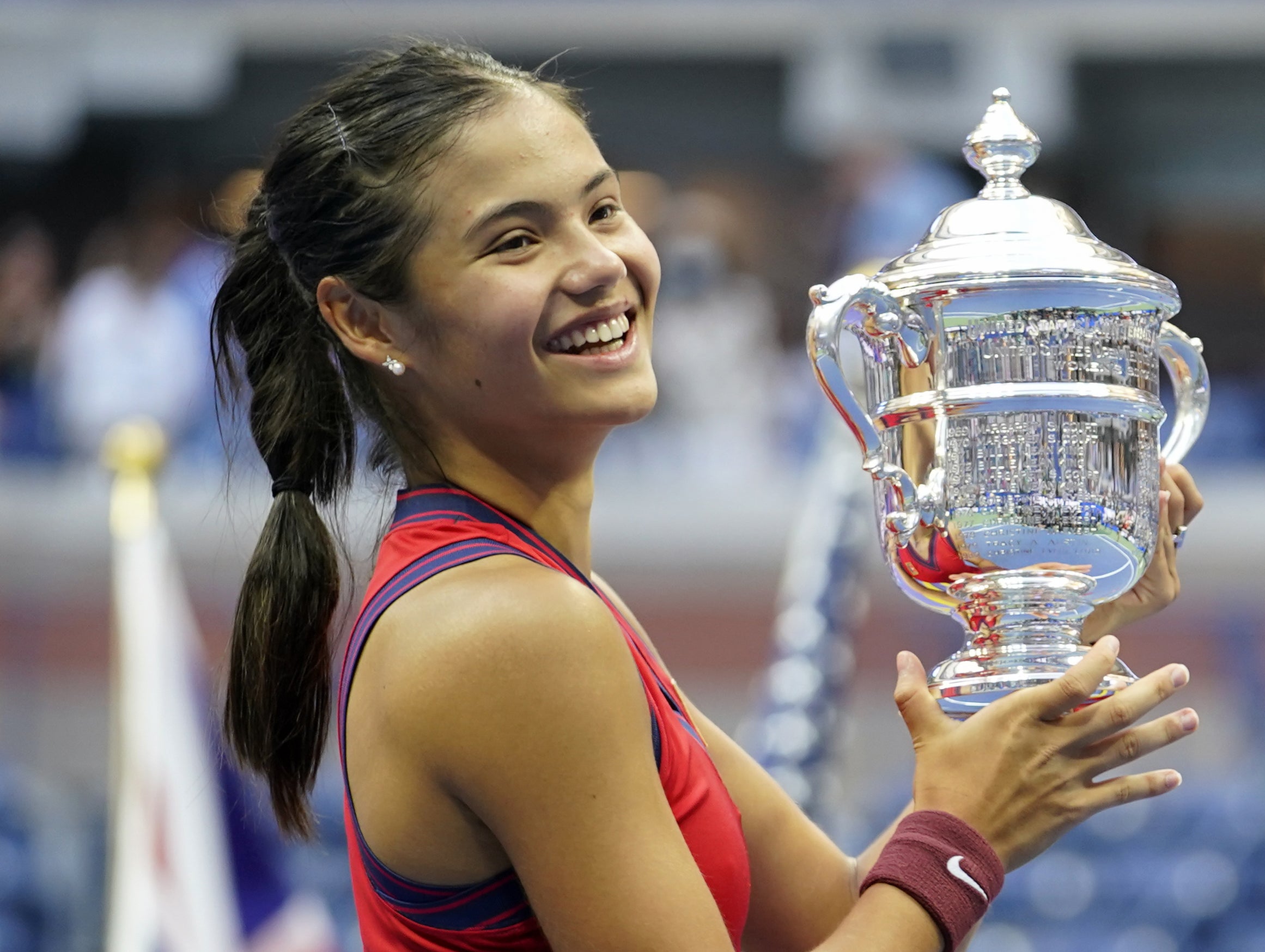 Lifting the US Open trophy has opened many doors for Emma Raducanu but also pushed expectations sky high (ZUMA)