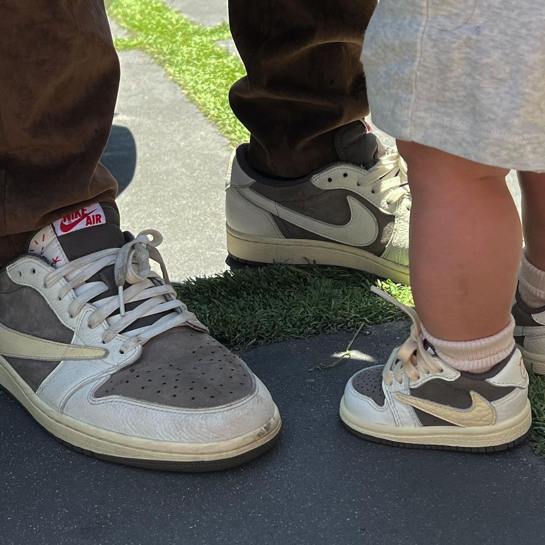 Scott and his son pictured wearing matching trainers