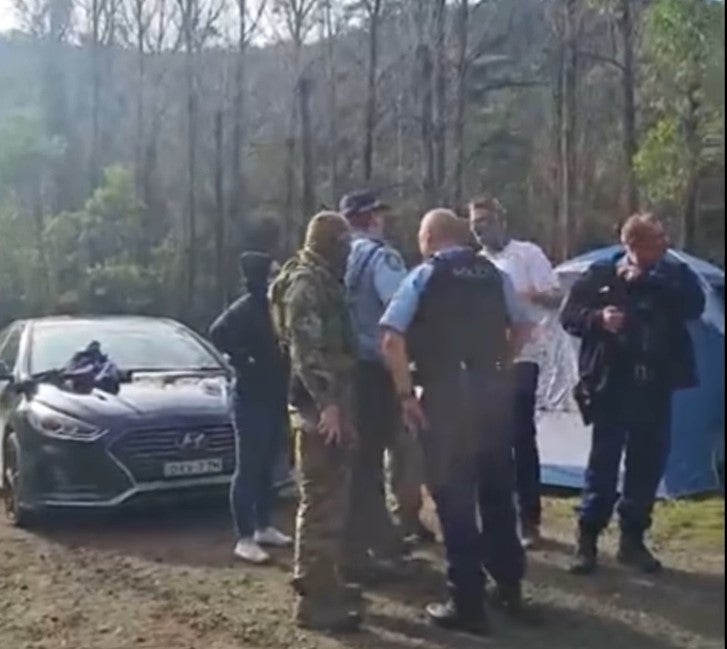 Police seen at the camp in footage taken by activists